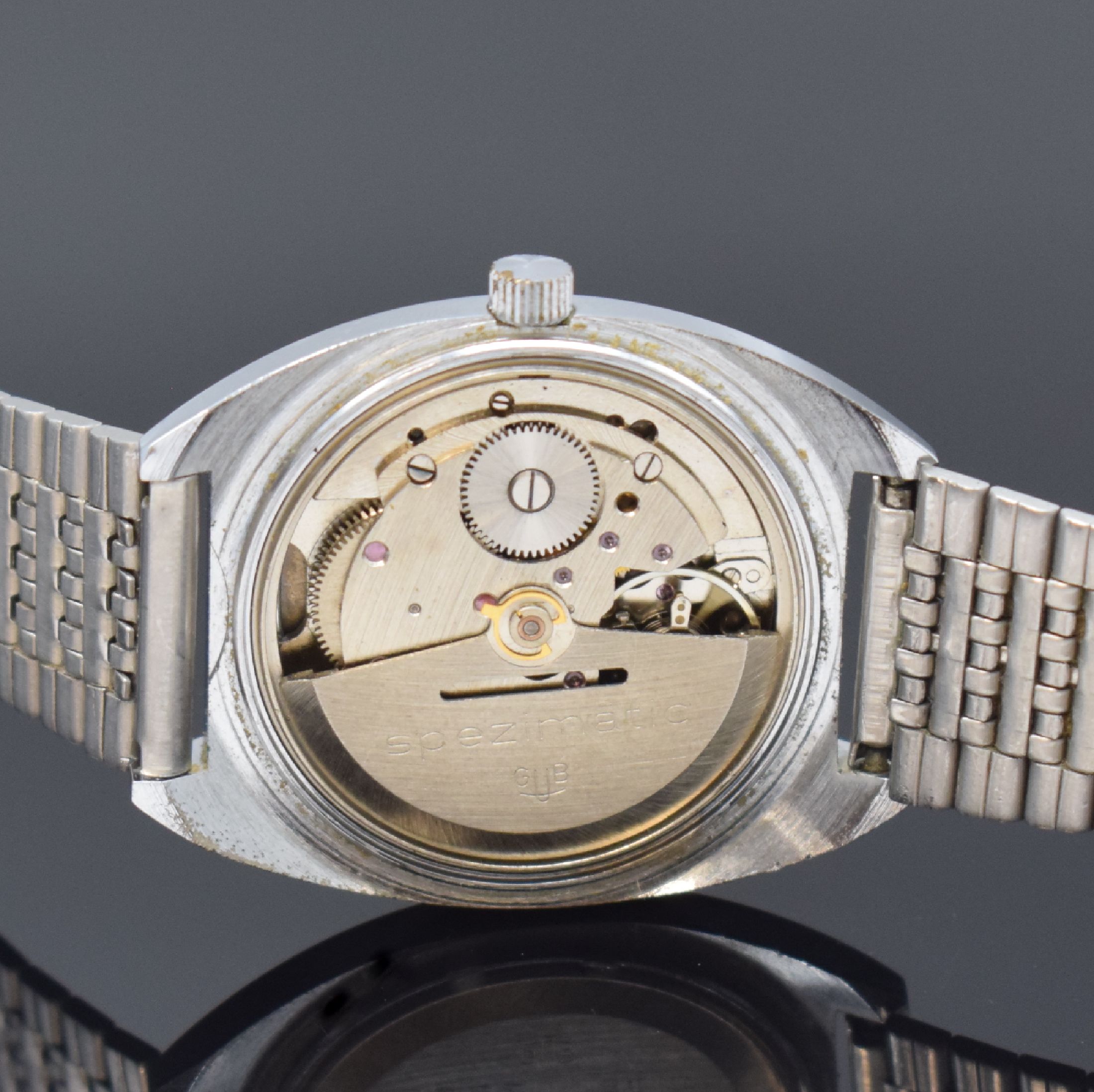 Detail e: GUB GLASHÜTTE 2 Armbanduhren, DDR um 1965 / 1970, Handaufzug / Automatik, 1.) verchromtes Geh. m. aufgedr. Stahlboden, blaues Zifferbl., silb. ...