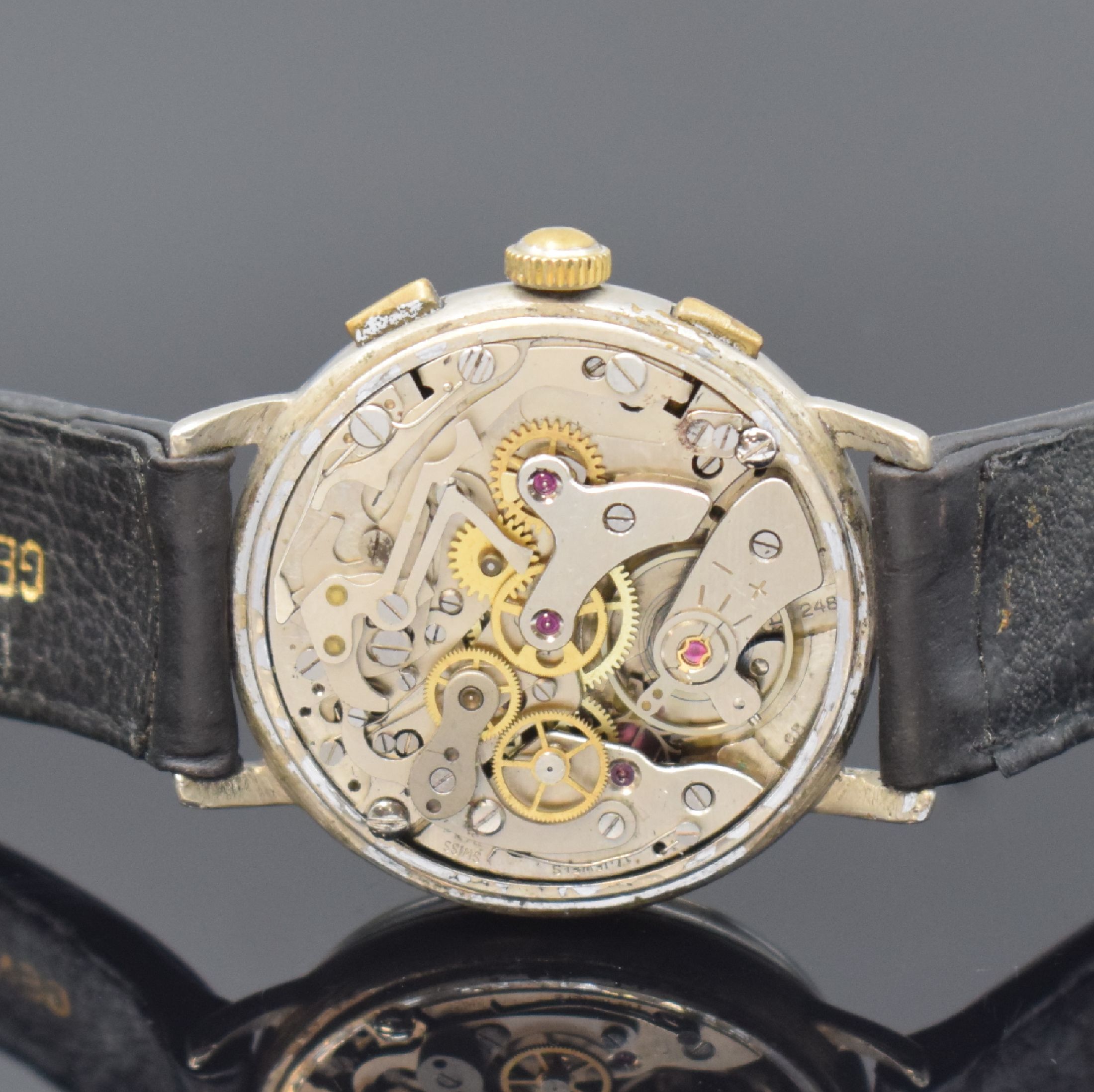 Detail d: ORATOR Armbandchronograph, Schweiz um 1950, Handaufzug, vern. Geh., gedr. Stahlboden, silb. Zifferbl. stark pat./fl., silb. Zeiger, vern. Werk Kal. ...