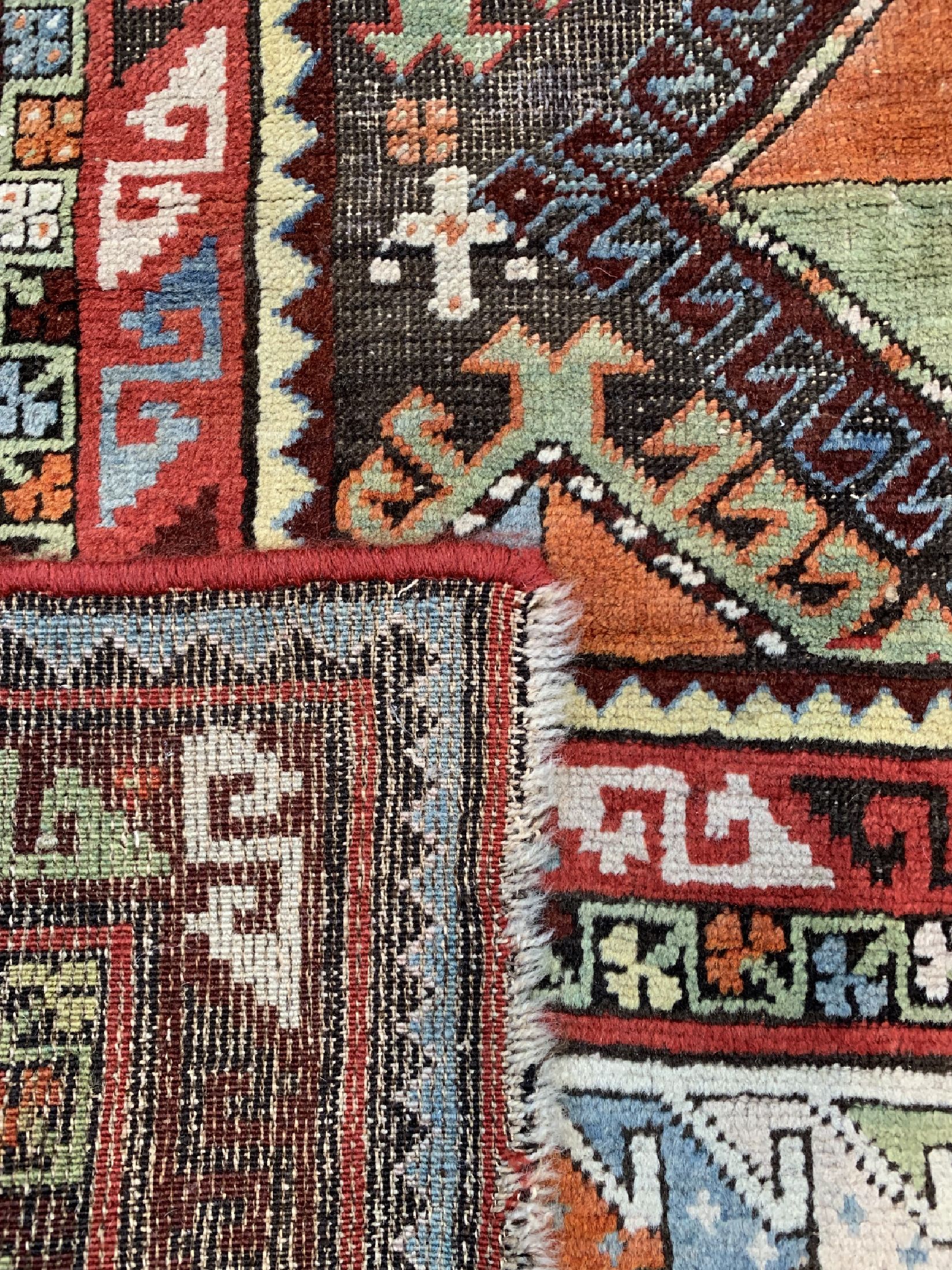 Detail d: Antiker Kazak, Persien, um 1900, Wolle auf Wolle, ca. 233 x 106 cm, EHZ: 3