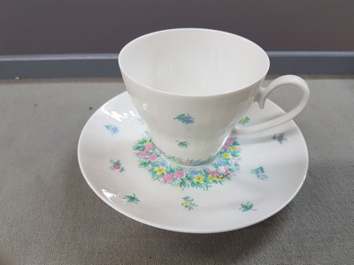 26667099c - Coffee service, Rosenthal, designed by Björn Wiinblad, form Romance with colorful floral decoration, coffee pot, sugar bowl, milk jug, cream jug, 11 cups, 12 saucers, 12 cake plates, 2 round plates, 2 round bowls, king cake plate, candlestick, vase, traces of usage