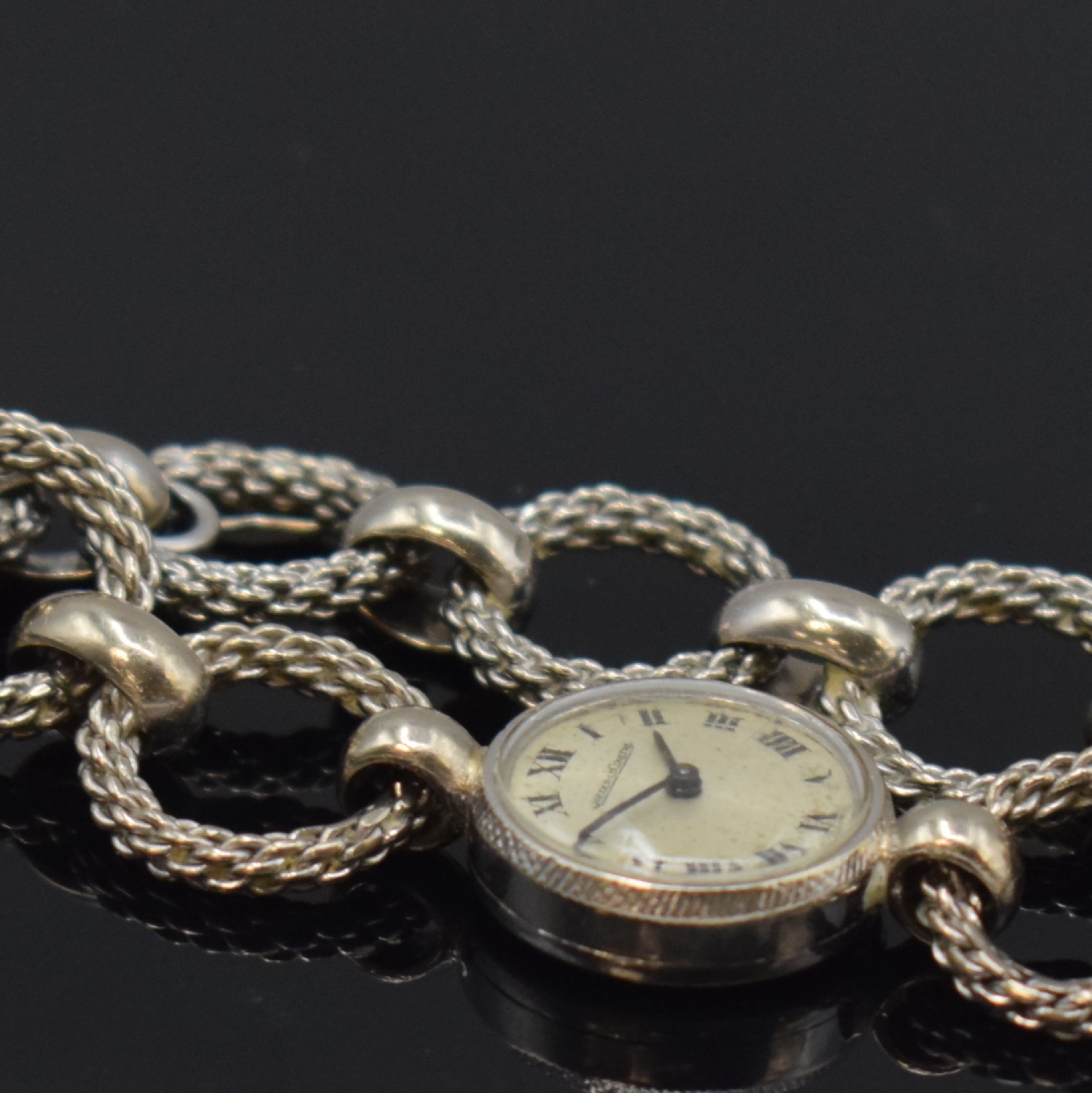 Detail c: Jaeger-LeCoultre ausgefallene Damenarmbanduhr in WG 750/000, Schweiz um 1970, Handaufzug, 2-teil. Gehäuse, Boden aufgedr., Ketten- Gliederband, ...