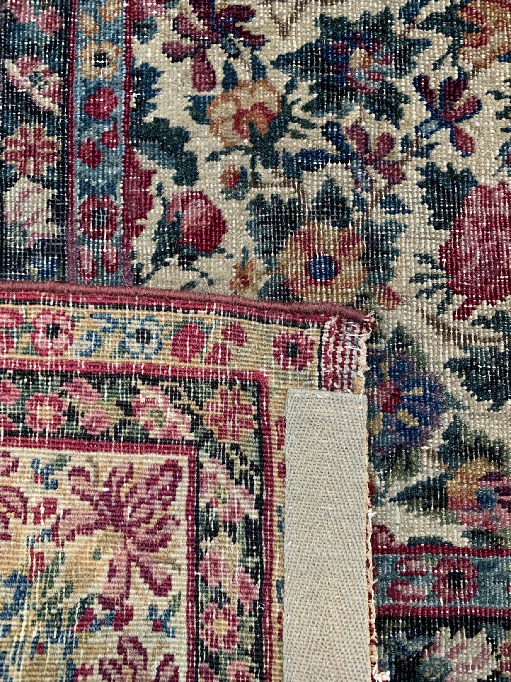 Detail d: Antiker Kerman Persien, signiert(Ostad Hossein Kermani), datiert 1294(1873), Wolle auf Baumwolle, ca. 210 x 130 cm, EHZ: 3(stellenweise ...