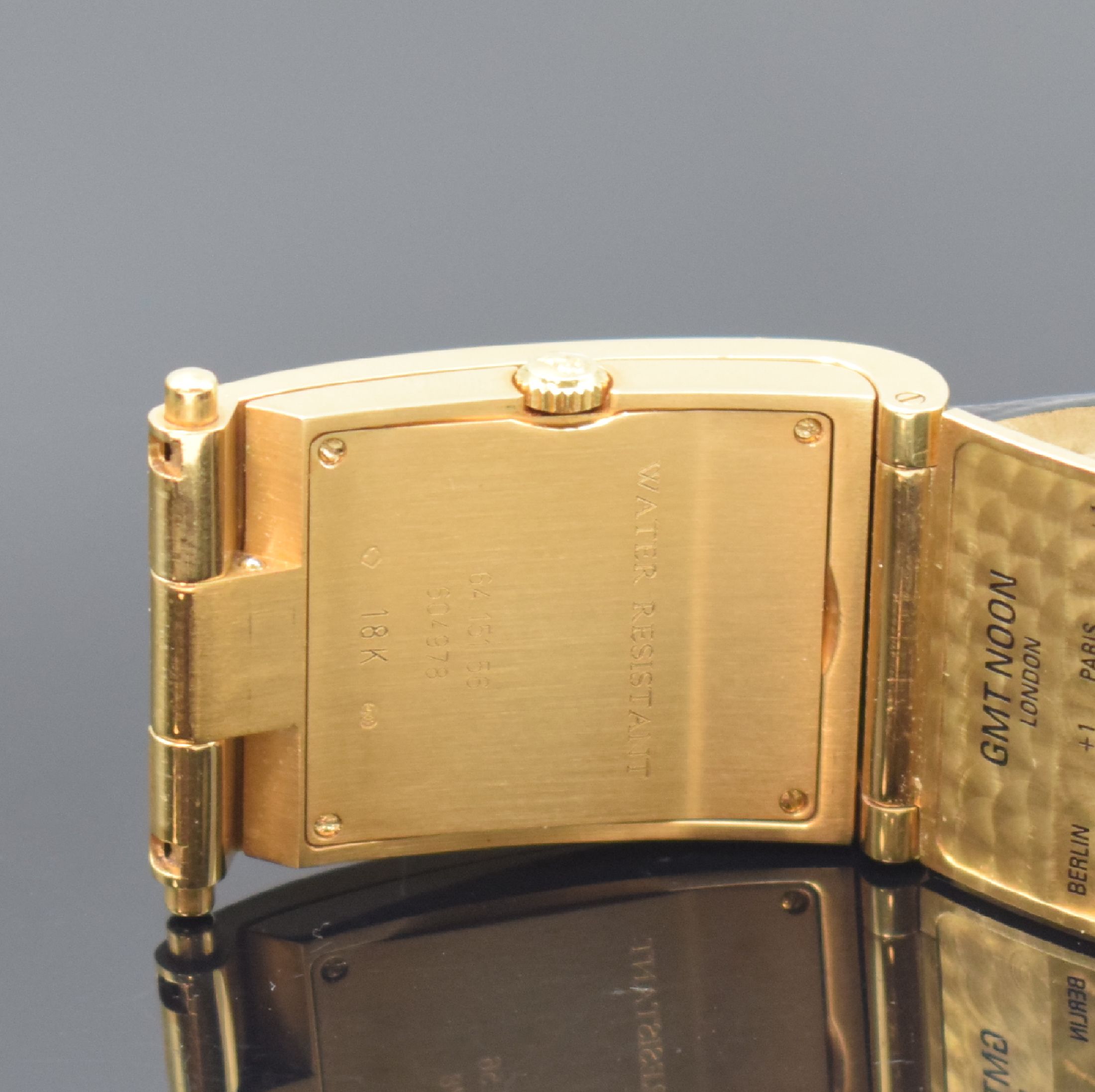 Detail e: CORUM Armbanduhr Serie Tabogan in GG 750/000 Referenz 64.151.56, Schweiz um 2000, quarz, orig. Lederband m. orig. GG 750/000 Dornschl., Oberteil zur ...