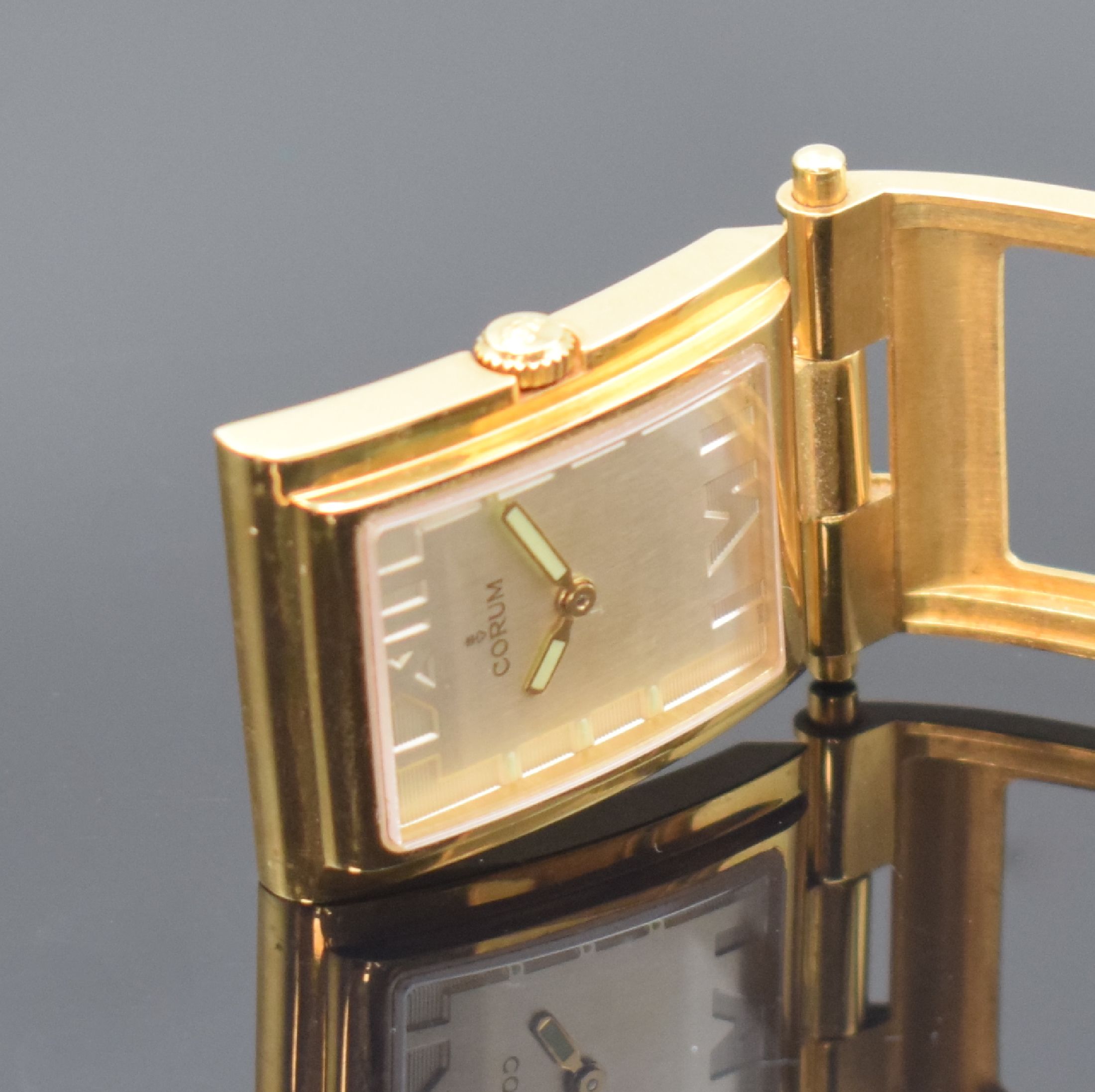 Detail g: CORUM Armbanduhr Serie Tabogan in GG 750/000 Referenz 64.151.56, Schweiz um 2000, quarz, orig. Lederband m. orig. GG 750/000 Dornschl., Oberteil zur ...