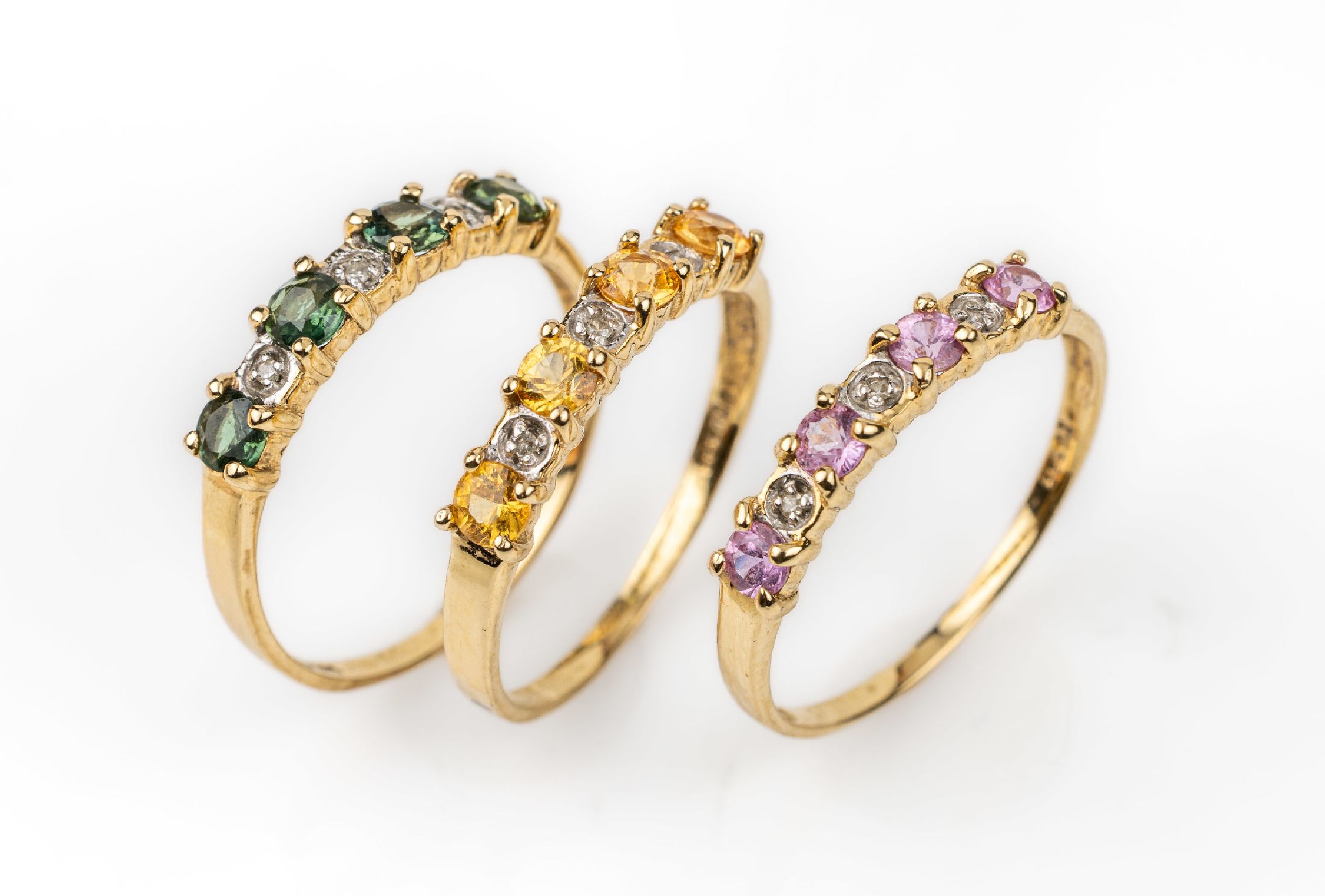 14 kt Gold Farbstein-Diamant-Ringtrio, GG 585/000, 1 x mit 4 kl. rundfacett. Turmalinen und 3 kl. 8/8-Diamanten, 1 x mit 4 kl. rundfacett. Citrinen ...