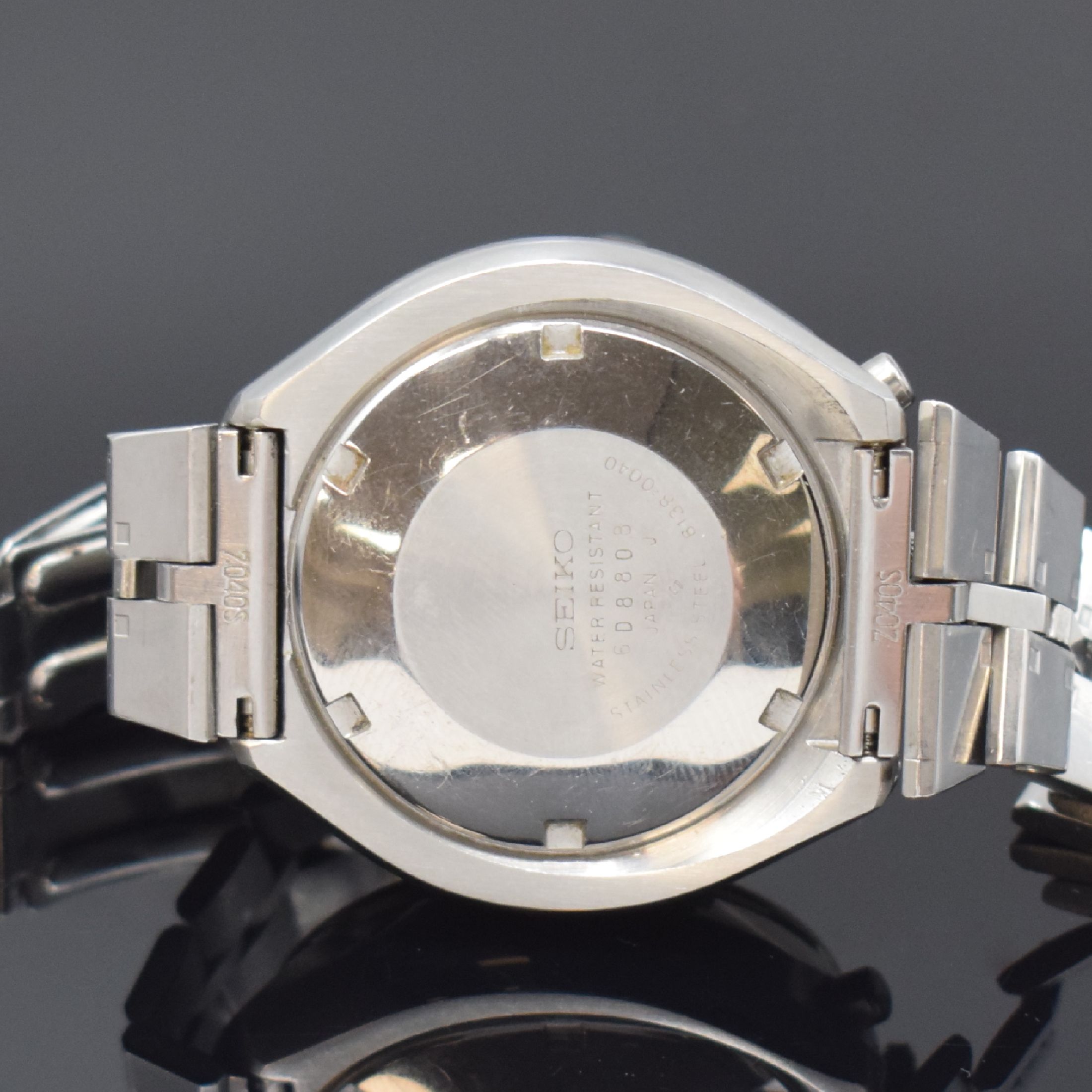 Detail d: SEIKO sog. BULLHEAD Armbandchronograph Referenz 6138-0040, Japan um 1970, Automatik, verschr. Edelstahlgeh., orig. Gliederband m. Faltschl., Lün. m. ...