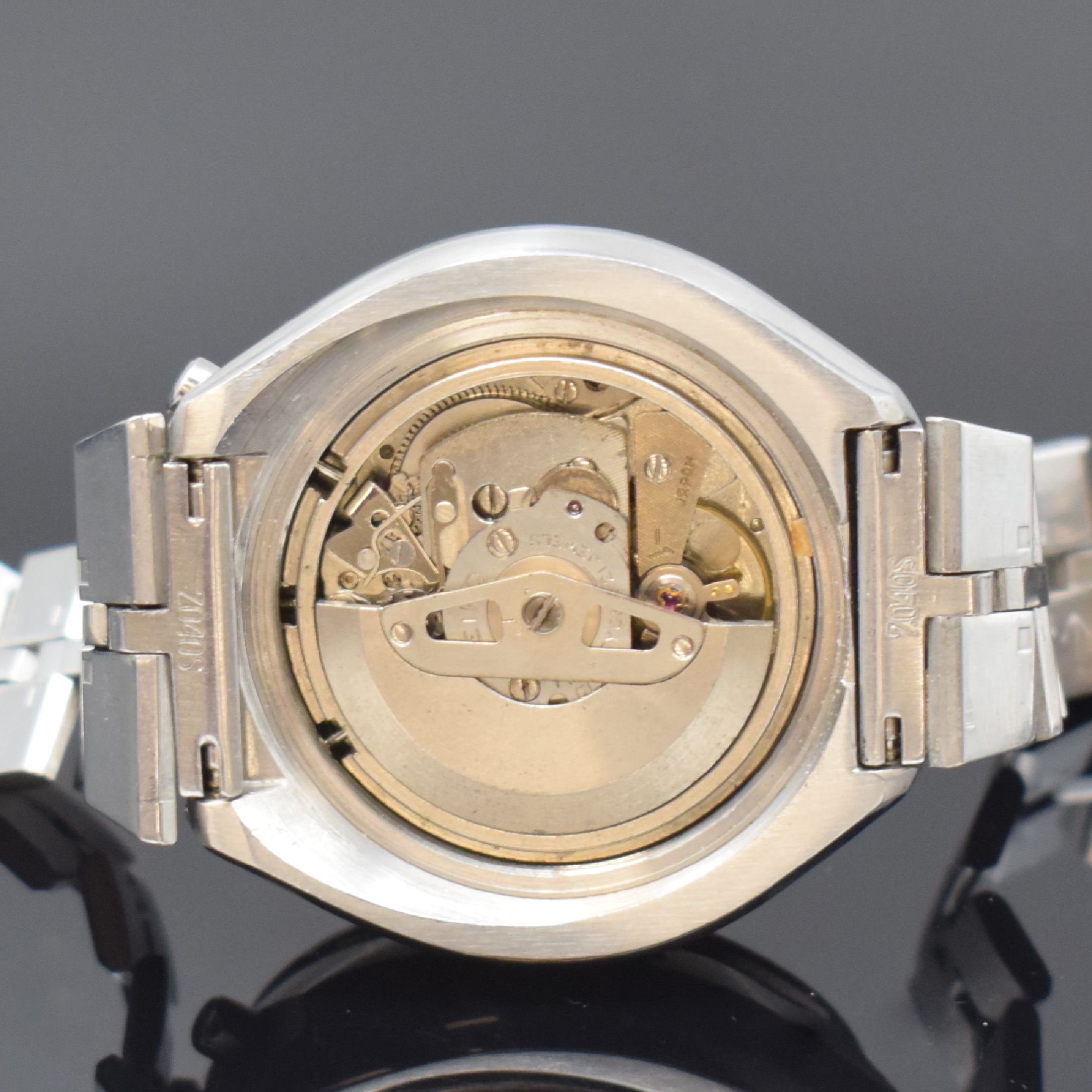 Detail e: SEIKO sog. BULLHEAD Armbandchronograph Referenz 6138-0040, Japan um 1970, Automatik, verschr. Edelstahlgeh., orig. Gliederband m. Faltschl., Lün. m. ...