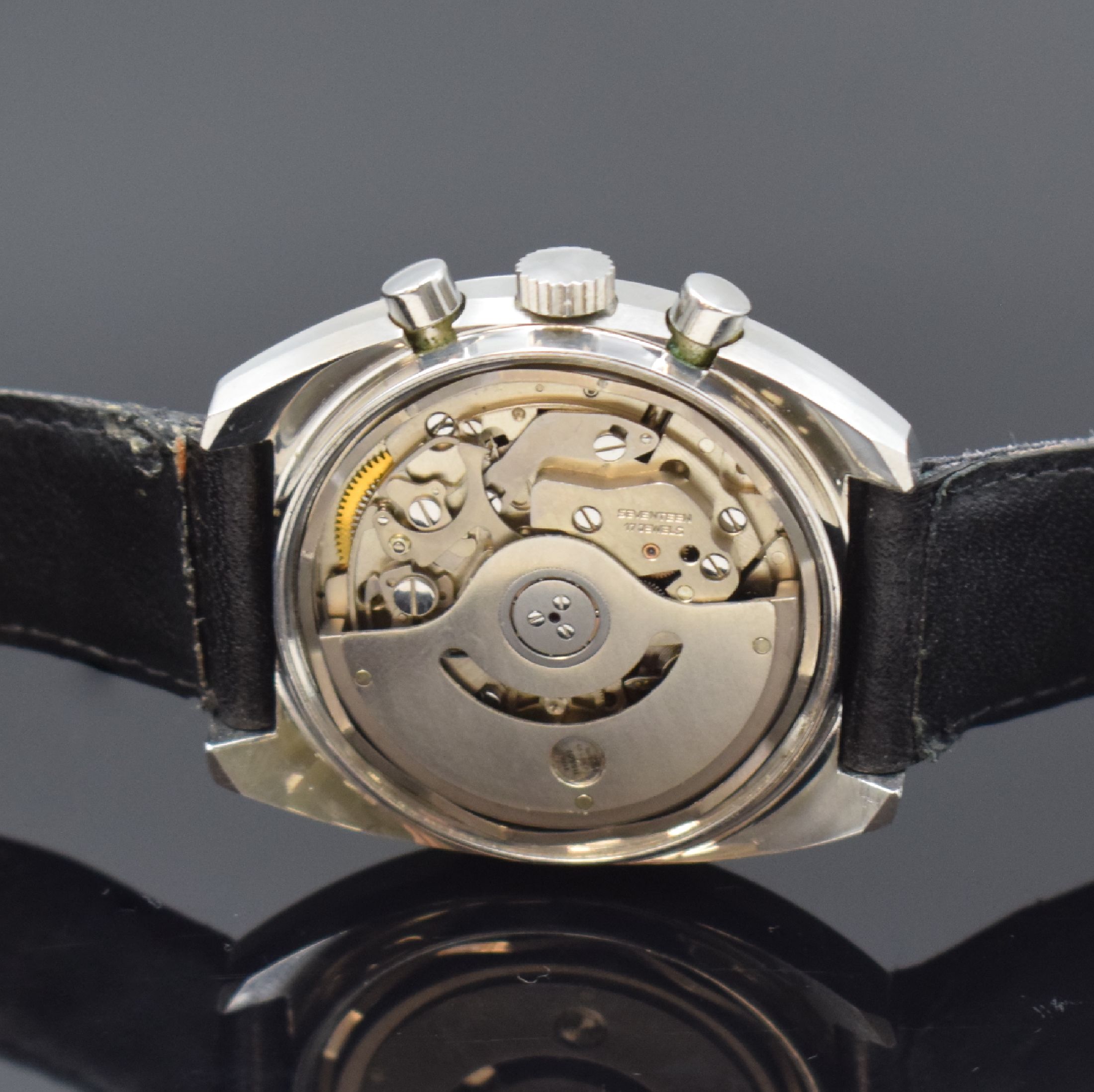 Detail d: TISSOT Navigator Armbandchronograph in Stahl Referenz 45501, Schweiz um 1975, Automatik, verschr. Geh., schwarz. Zifferbl., Leuchtindizes u. -zeiger, ...