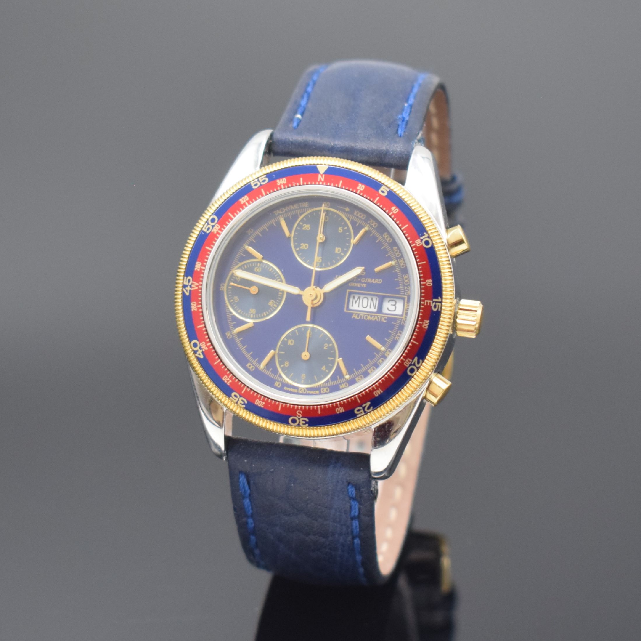 JAQUET GIRARD Armbandchronograph in Stahl, Automatik, Schweiz um 2000, Boden und Krone verschr., verg. Riffel-Lünette m. blau/roter Windrose und ...