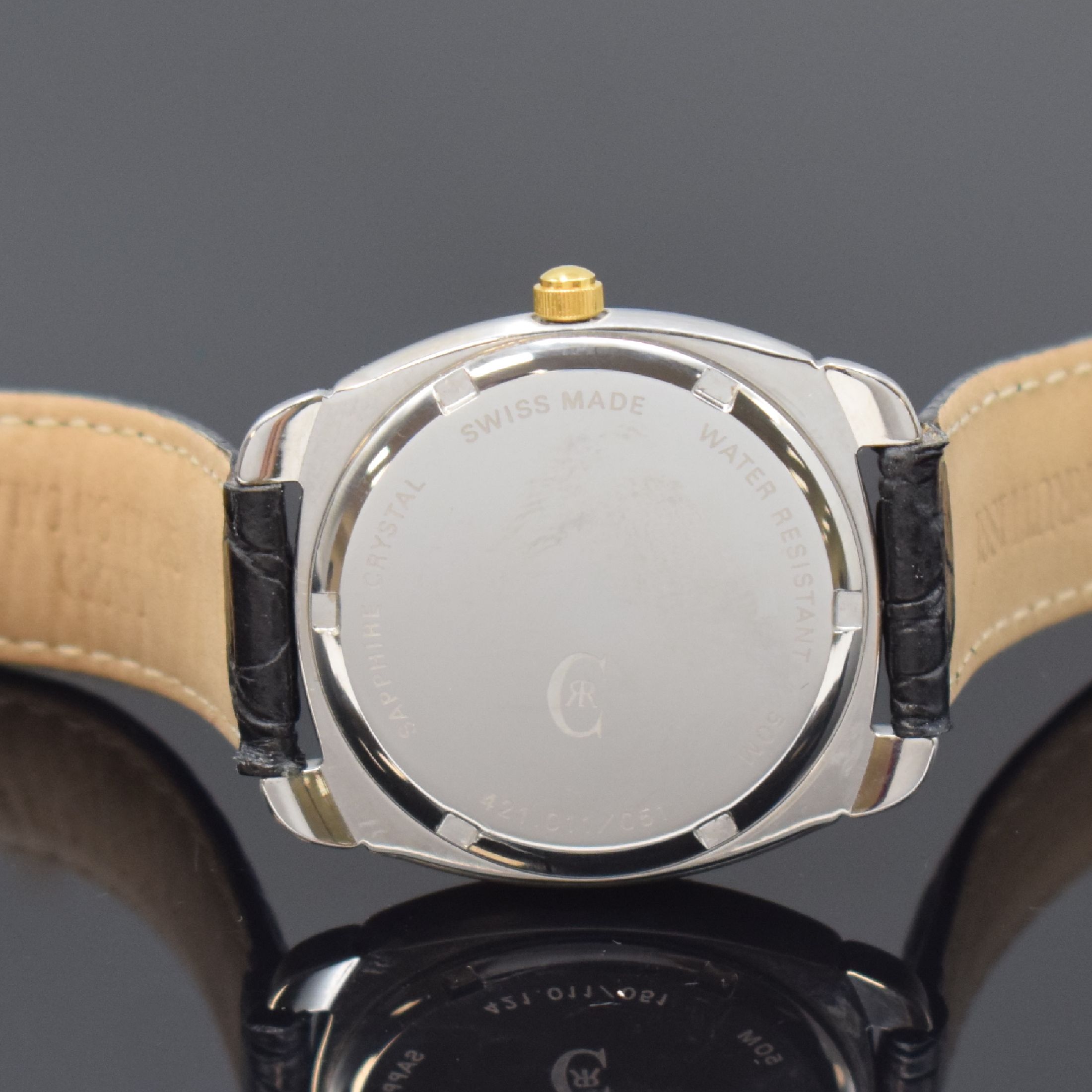 Detail c: CERRUTI Armbanduhr, Automatik, Schweiz um 1995, Stahlgeh. m. verg. Riffel-Lünette, Boden verschr., orig. Lederband, weißes Zifferbl. m. gold. ...