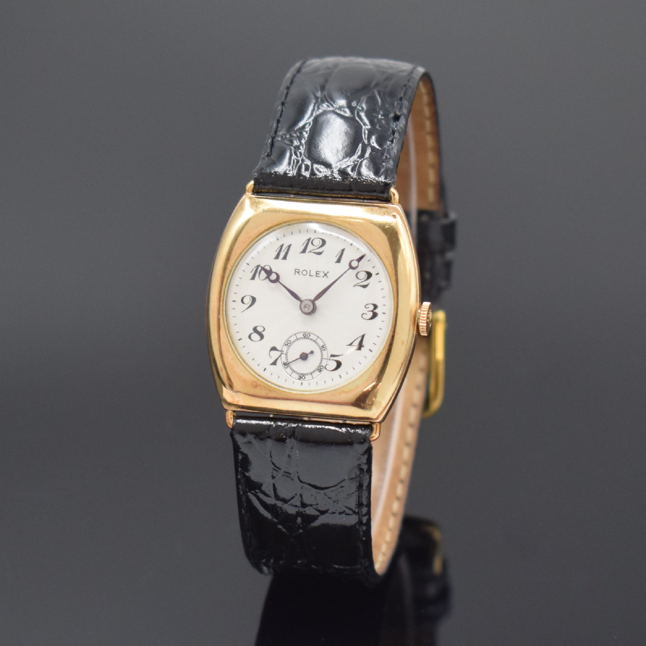 ROLEX Armbanduhr in RG 375/000 Referenz 1017, Schweiz um 1930, Handaufzug, Boden m. Gravur aufgedr., silb. guill. Zifferbl. m. arab. Zahlen, gebl. ...
