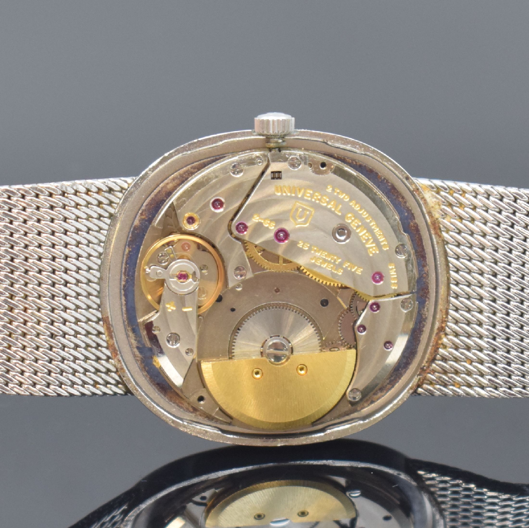 Detail d: UNIVERSAL GENEVE White Shadow Armbanduhr Referenz 866051, Schweiz um 1985, Automatik, Edelstahlgeh. inkl. Meshband, Boden aufgedr., blaues Zifferbl. ...