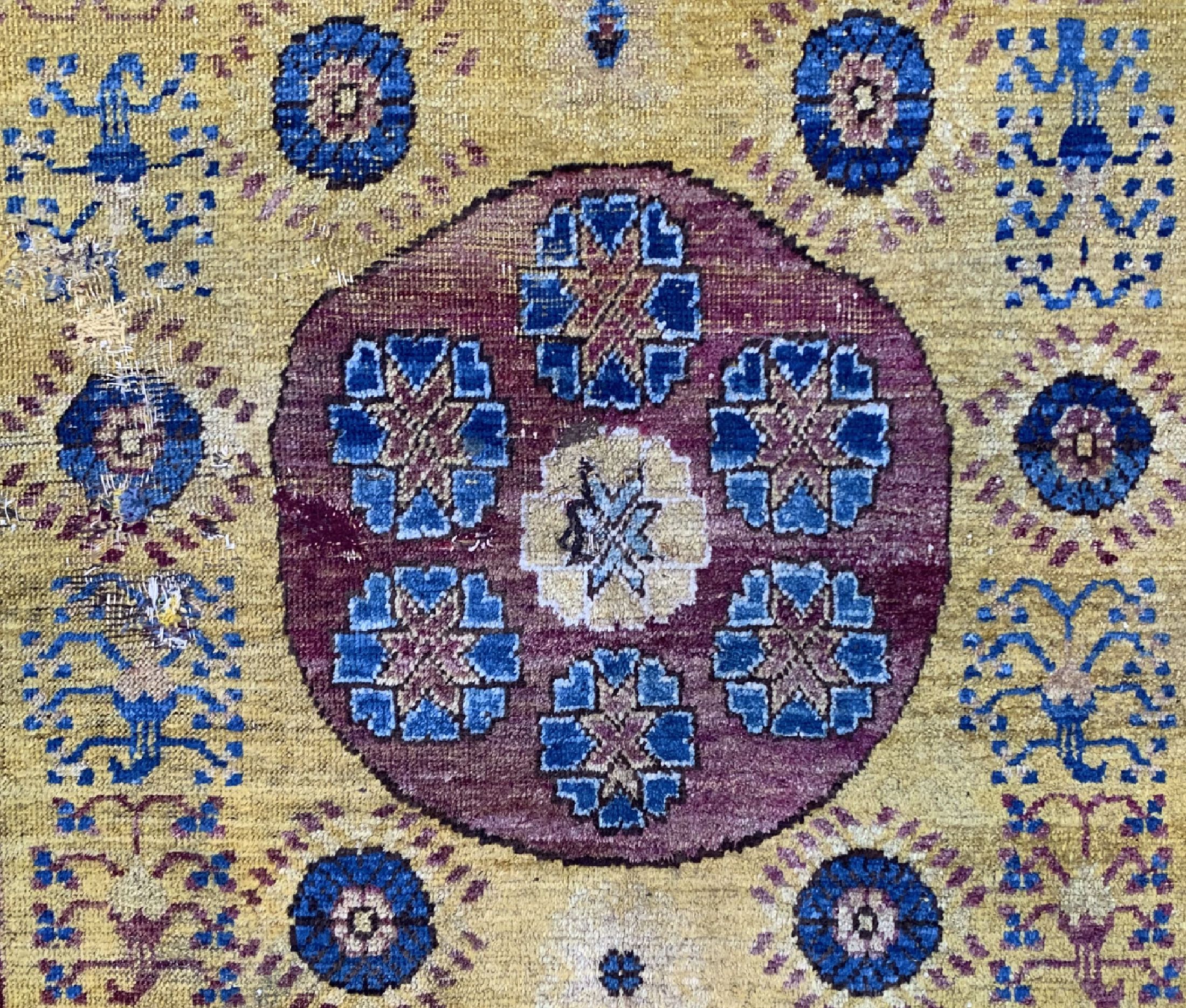 Detail b: Antiker Khotan, Turkestan, Anfang 19.Jhd, Wolle auf Baumwolle, ca. 347 x 210 cm, EHZ: 4