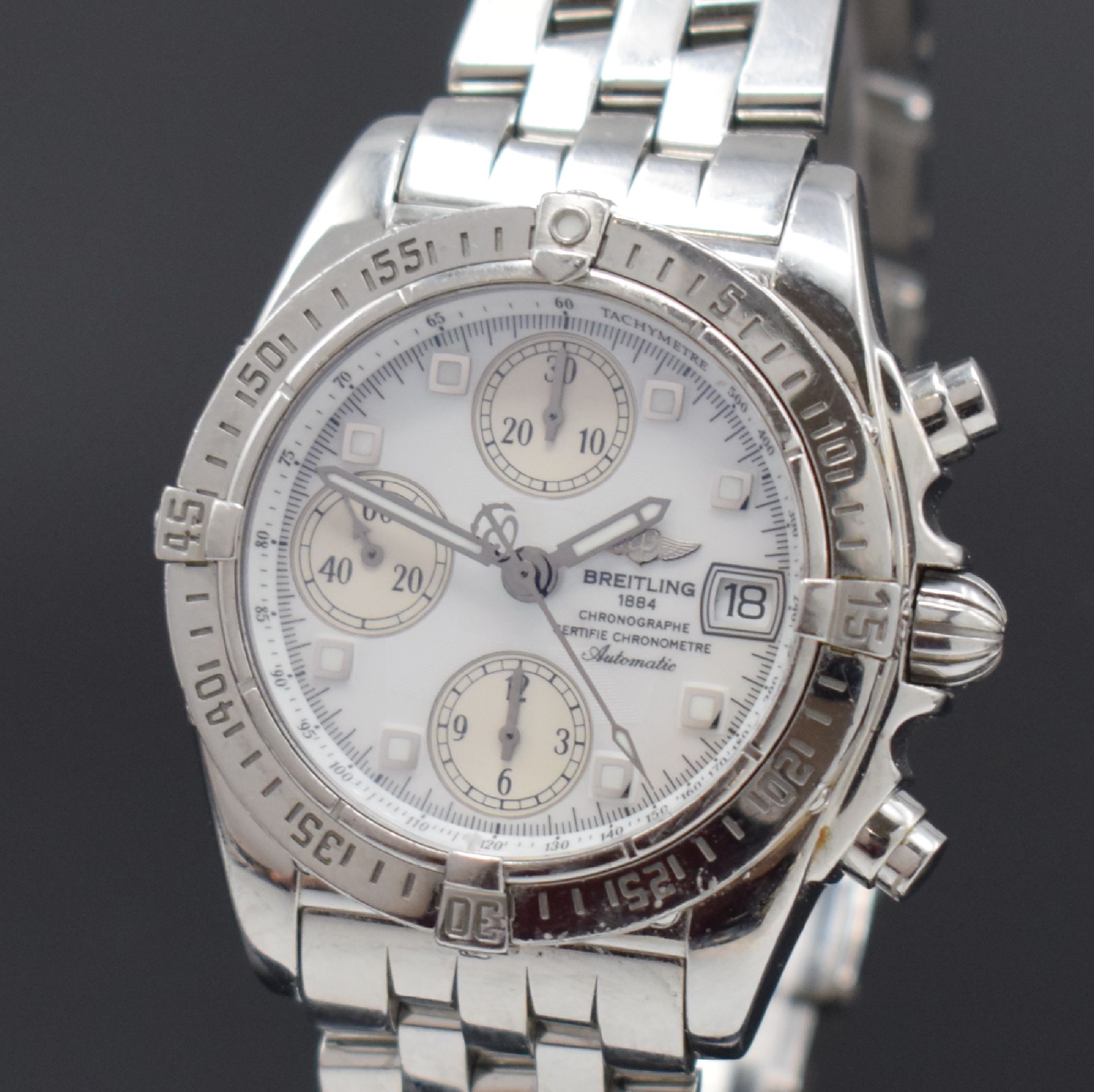 Detail a: BREITLING Herrenarmbanduhr Chrono Cockpit Referenz A13357, Automatik, Schweiz um 2007, Chronometer in Edelstahl inkl. Pilotband m. Faltschl., Boden ...