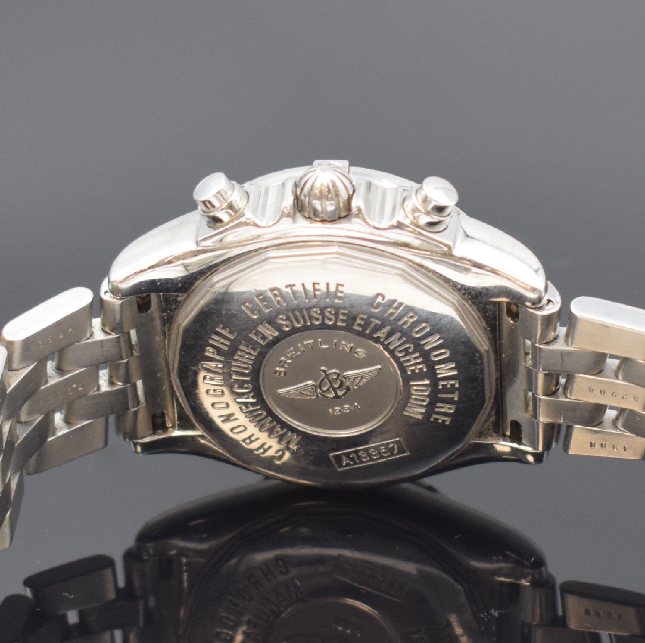 Detail d: BREITLING Herrenarmbanduhr Chrono Cockpit Referenz A13357, Automatik, Schweiz um 2007, Chronometer in Edelstahl inkl. Pilotband m. Faltschl., Boden ...