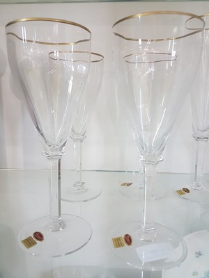 26675618b - Glass set, Moser Karlsbad, 6 champagne flutes and 5 wine glasses, colorless glass, optically blown, gold rims, height approx. 24.5/20cm