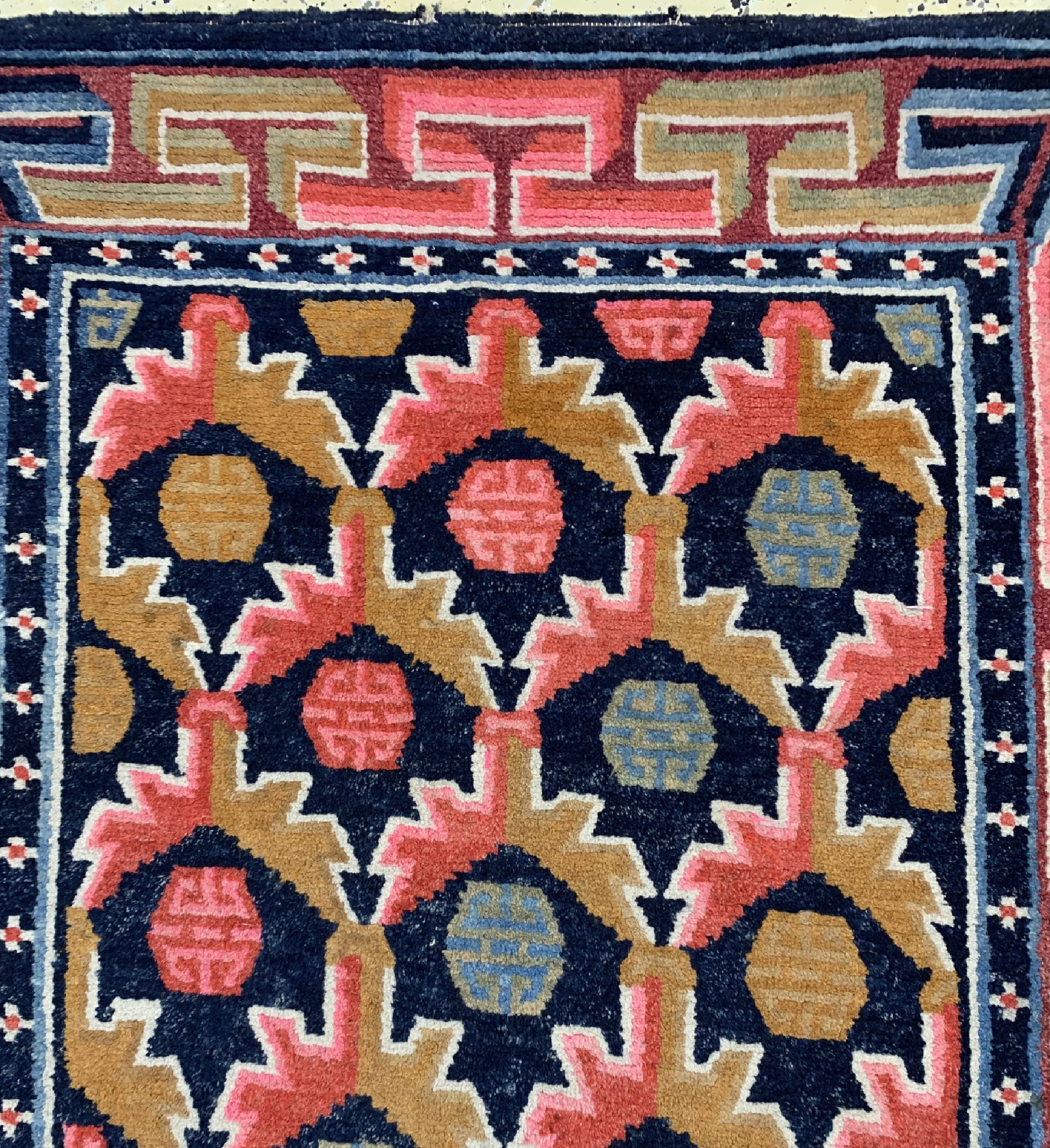Detail c: Khaden alt, Tibet, um 1920/1930, Wolle auf Baumwolle, ca. 160 x 82 cm, EHZ: 2