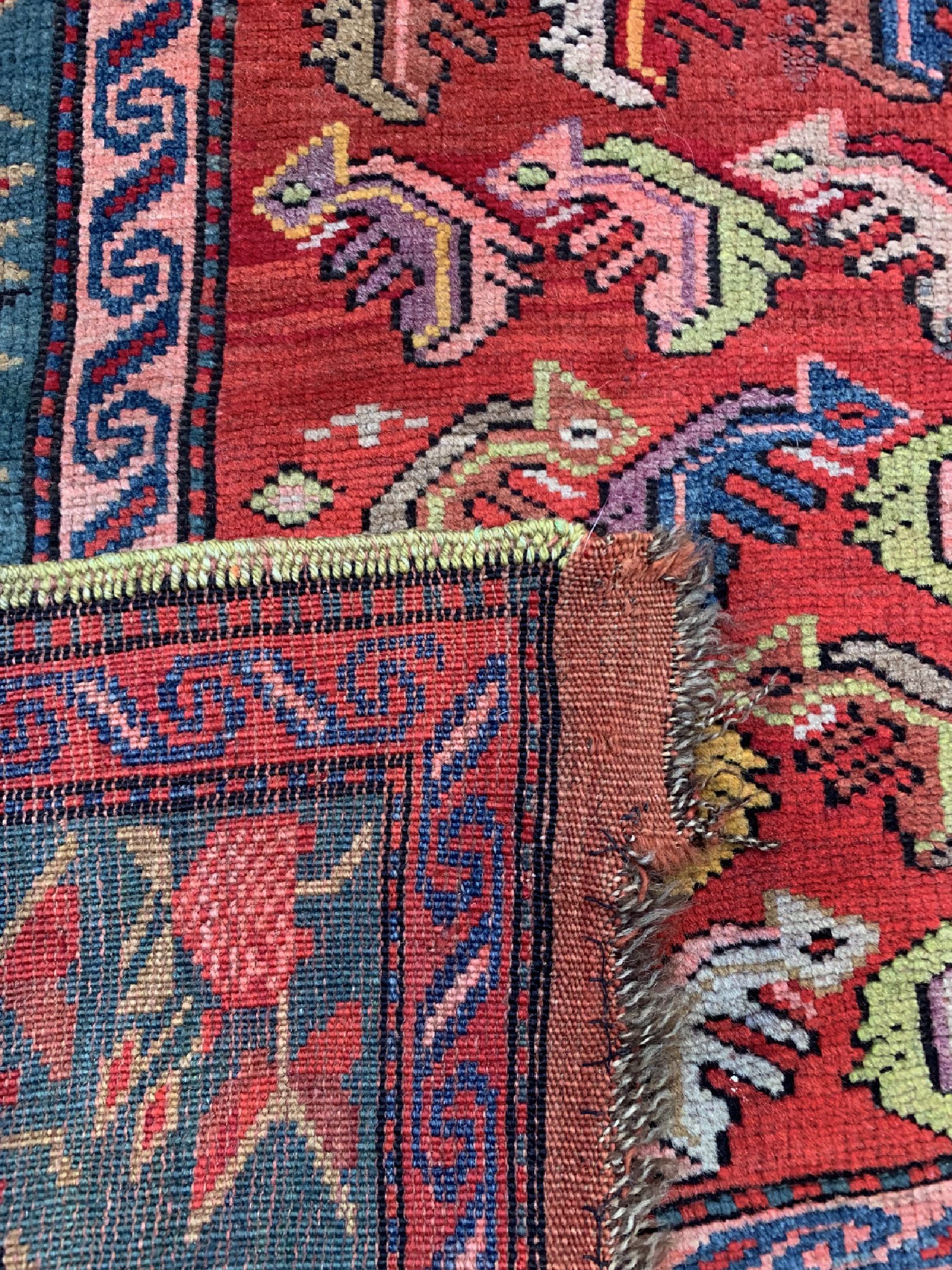 Detail d: Karabagh antik, Kaukasus, um 1900, Wolle auf Wolle, ca. 200 x 122 cm, EHZ: 3(verzogen)