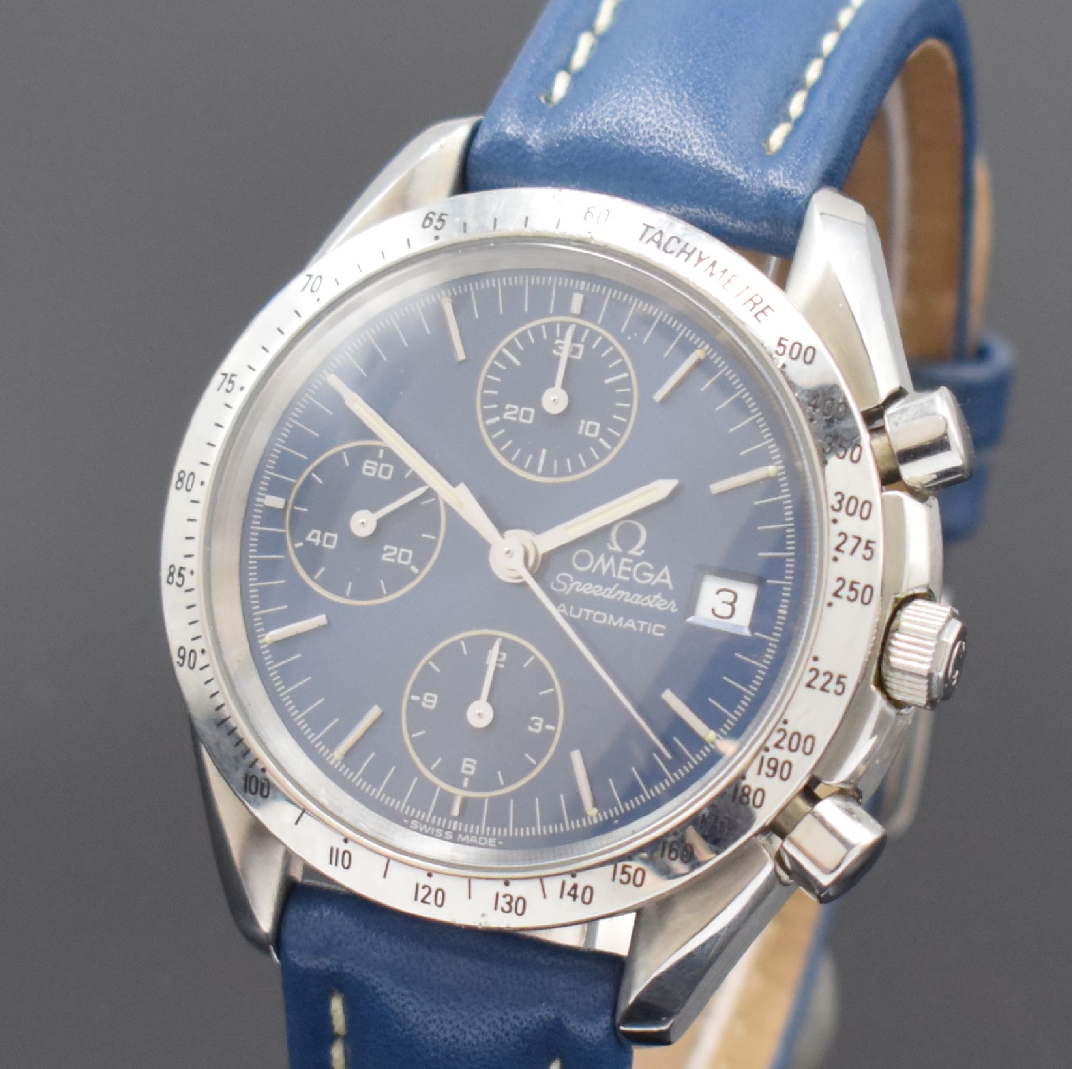 Detail a: OMEGA Speedmaster Armbandchronograph in Stahl Referenz 175.0043, Schweiz um 1995, Automatik, Boden aufgedr., Lünette m. Tachymeterskala, blaues ...