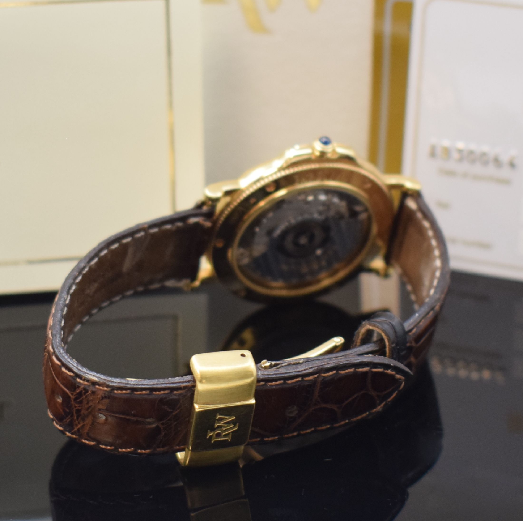 Detail b: RAYMOND WEIL Parsifal Herrenarmbanduhr in GG 750/000, Schweiz um 1995, Automatik, beids. vergl. Gehäuse, Boden 6-fach verschr., Lederband m. verg. ...
