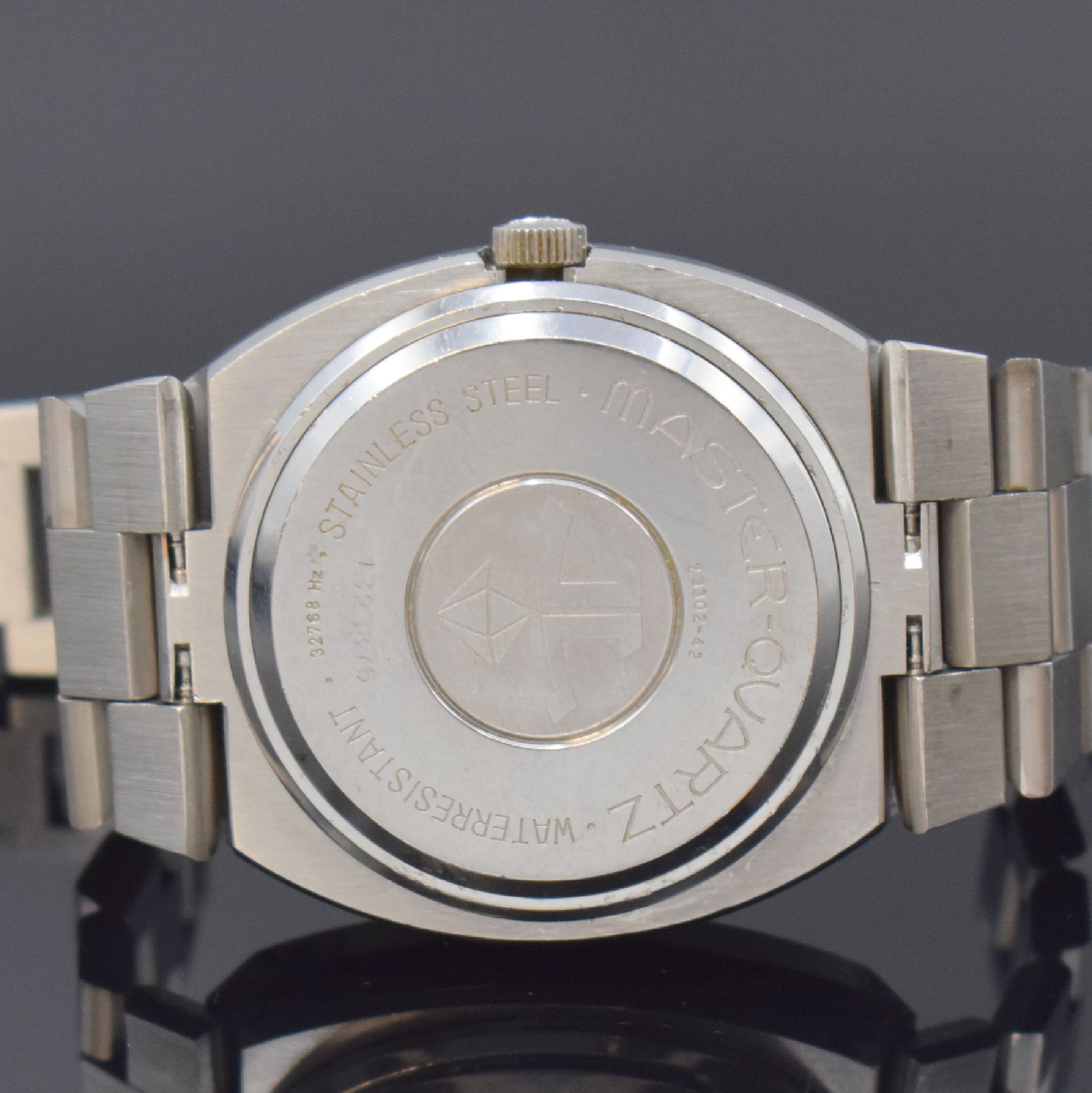 Detail d: Jaeger-LeCoultre Master-Quarz große Herrenarmbanduhr in Stahl Referenz 23302-42,Schweiz um 1970, quarz, massives 2-teiliges Geh., Boden aufgedr., ...