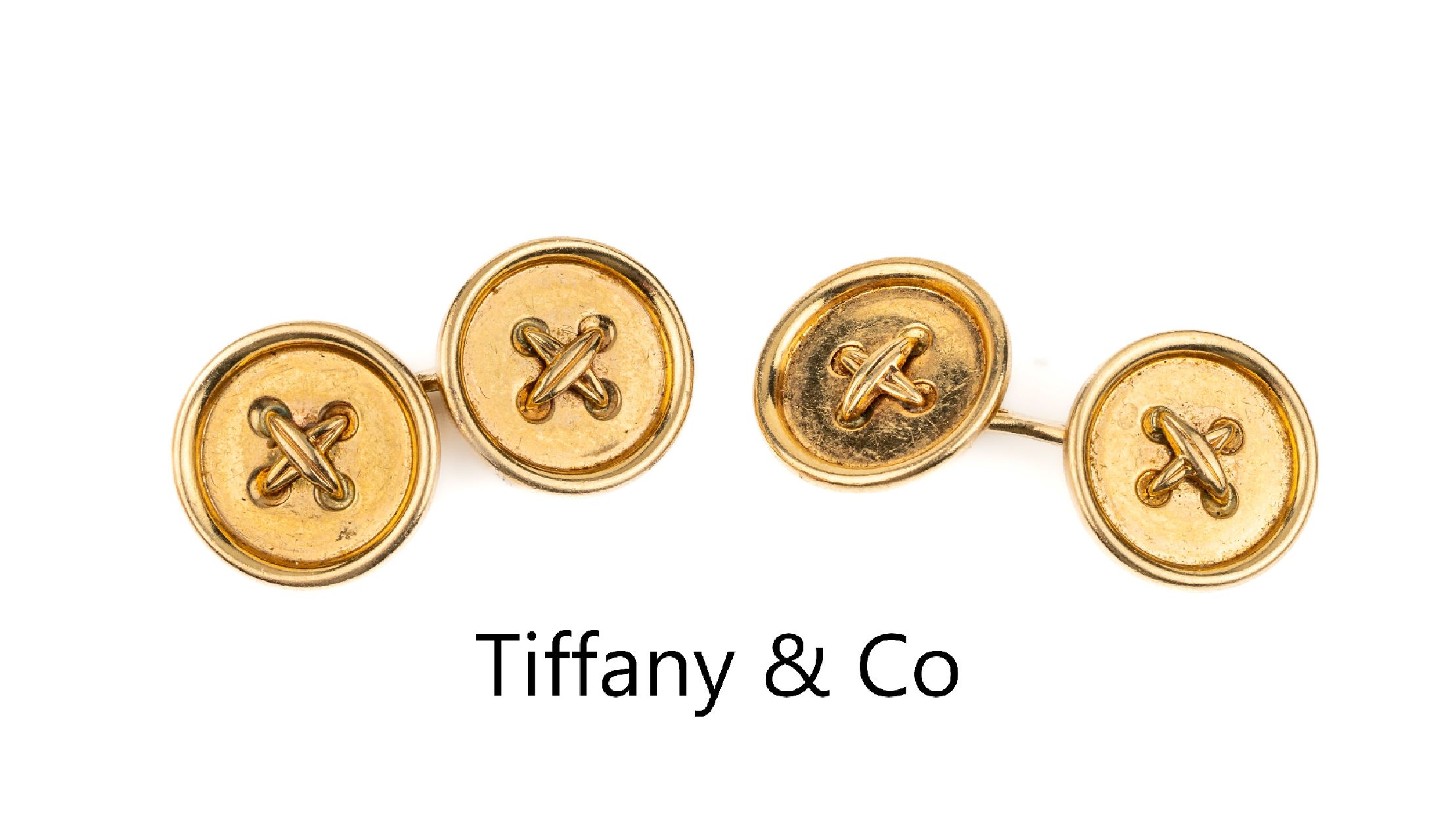 Paar 18 kt Gold TIFFANY & Co Manschettenknöpfe, GG 750/000, runde Platten Form eines Knopfes, sign., ca. 9.6 g