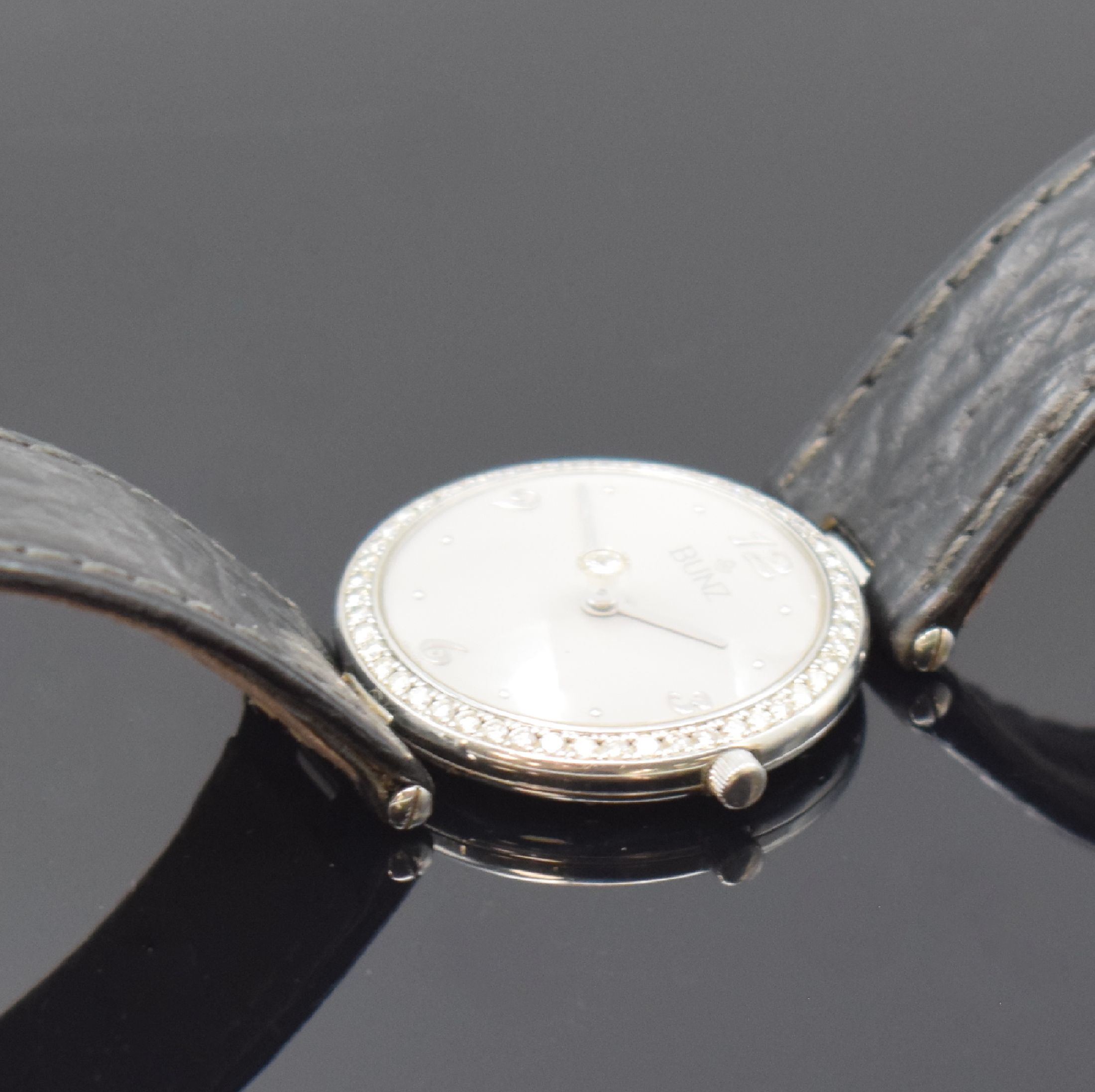 Detail b: BUNZ ausgefallene Armbanduhr DIAMONDTIME, Schweiz um 2005, quarz, Edelstahl inkl. orig. Lederband m. orig. Dornschl., Boden 6-fach verschr., Lünette ...