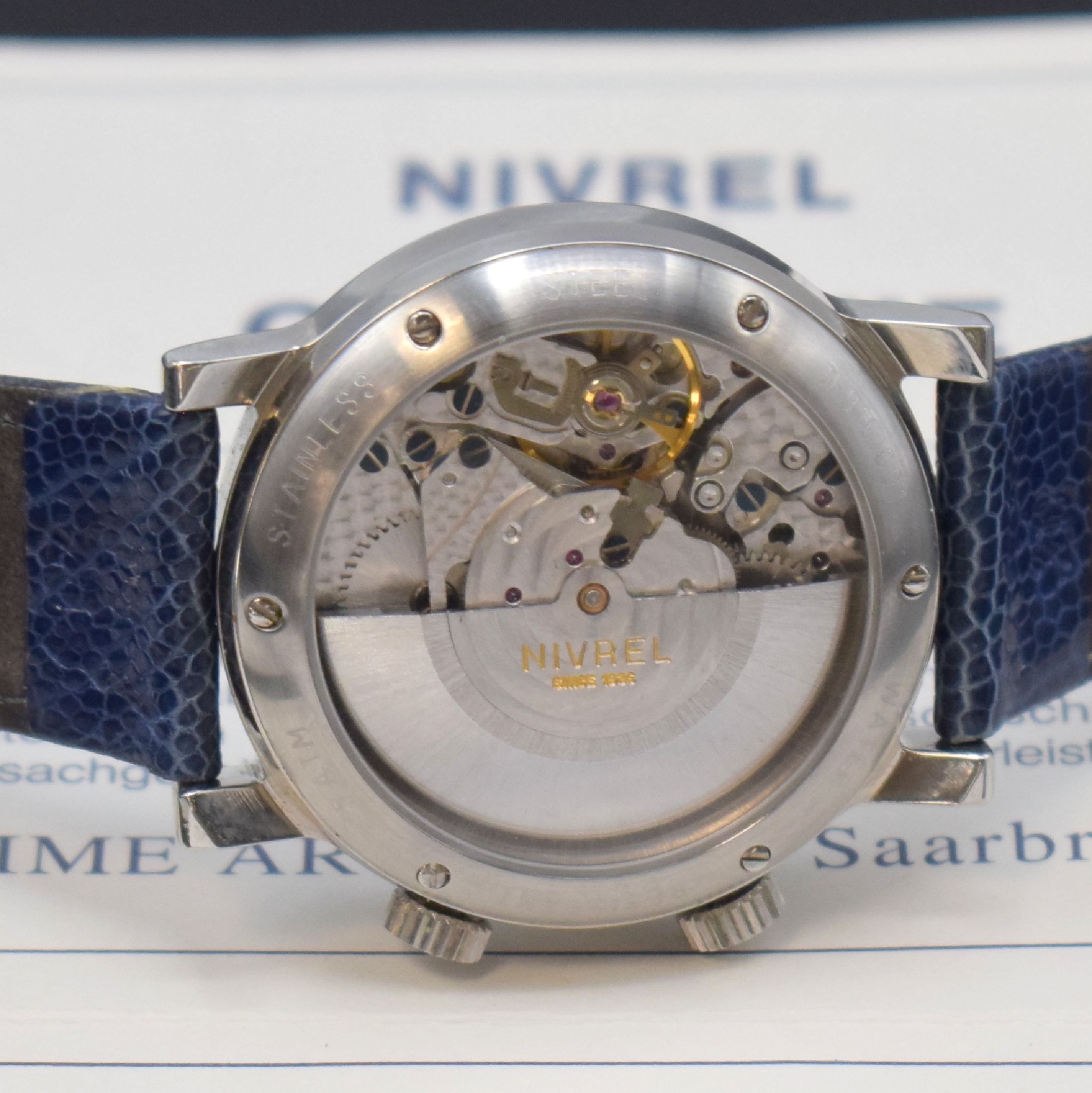Detail d: NIVREL Herrenarmbanduhr mit Wecker, Automatik, Schweiz verk. lt. beil. Pap. 03/1999, Edelstahlgehäuse inkl. orig. Lederband mit orig. Dornschließe, ...