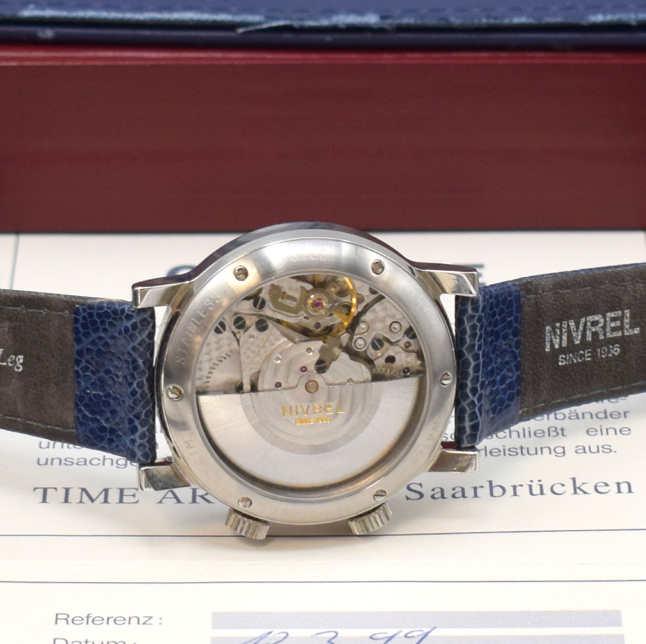 Detail e: NIVREL Herrenarmbanduhr mit Wecker, Automatik, Schweiz verk. lt. beil. Pap. 03/1999, Edelstahlgehäuse inkl. orig. Lederband mit orig. Dornschließe, ...