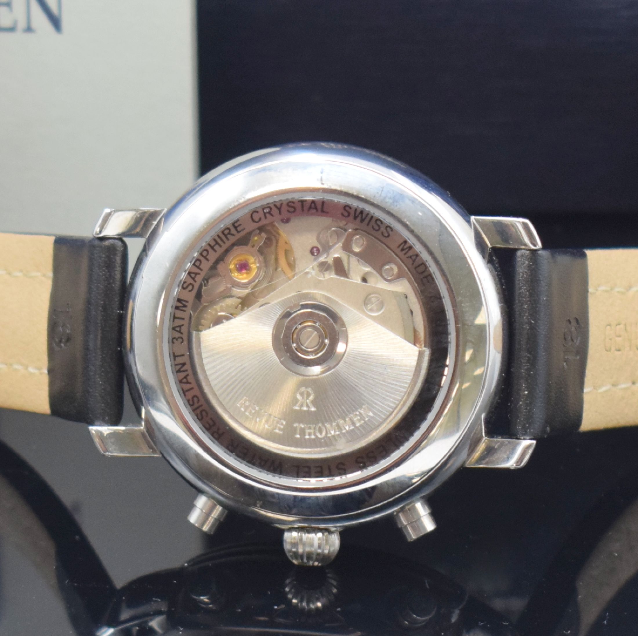 Detail e: REVUE THOMMEN Herrenarmbanduhr mit Chronograph, Schweiz um 2006, Automatik, beids. vergl. Edelstahlgeh., Boden aufgedr., orig. Lederband m. orig. ...
