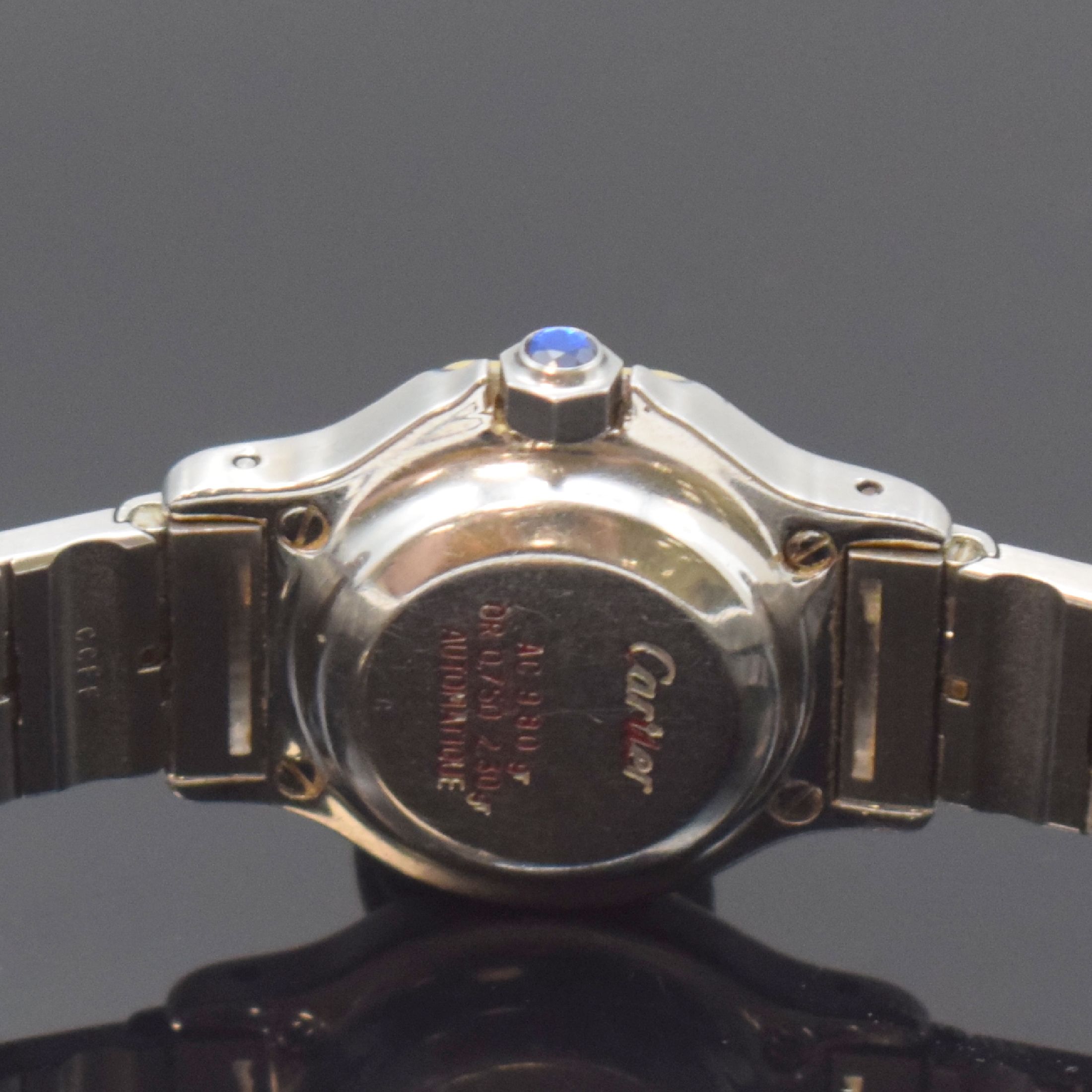 Detail d: CARTIER Santos Damenarmbanduhr in Edelstahl/Gold, Schweiz um 1990, Automatik, Monocoque Geh., 750/000 GG Lünette 8-fach verschr., Gliederband m. ...