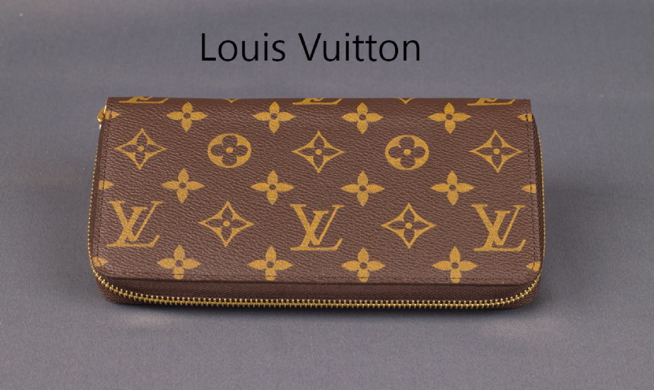 LOUIS VUITTON Zippy Geldbörse, Monogram Canvas, Innenfutter genarbtes Rindsleder, goldfarbene Beschläge, 3 große Innenfächer mitSeitenfalten, ...