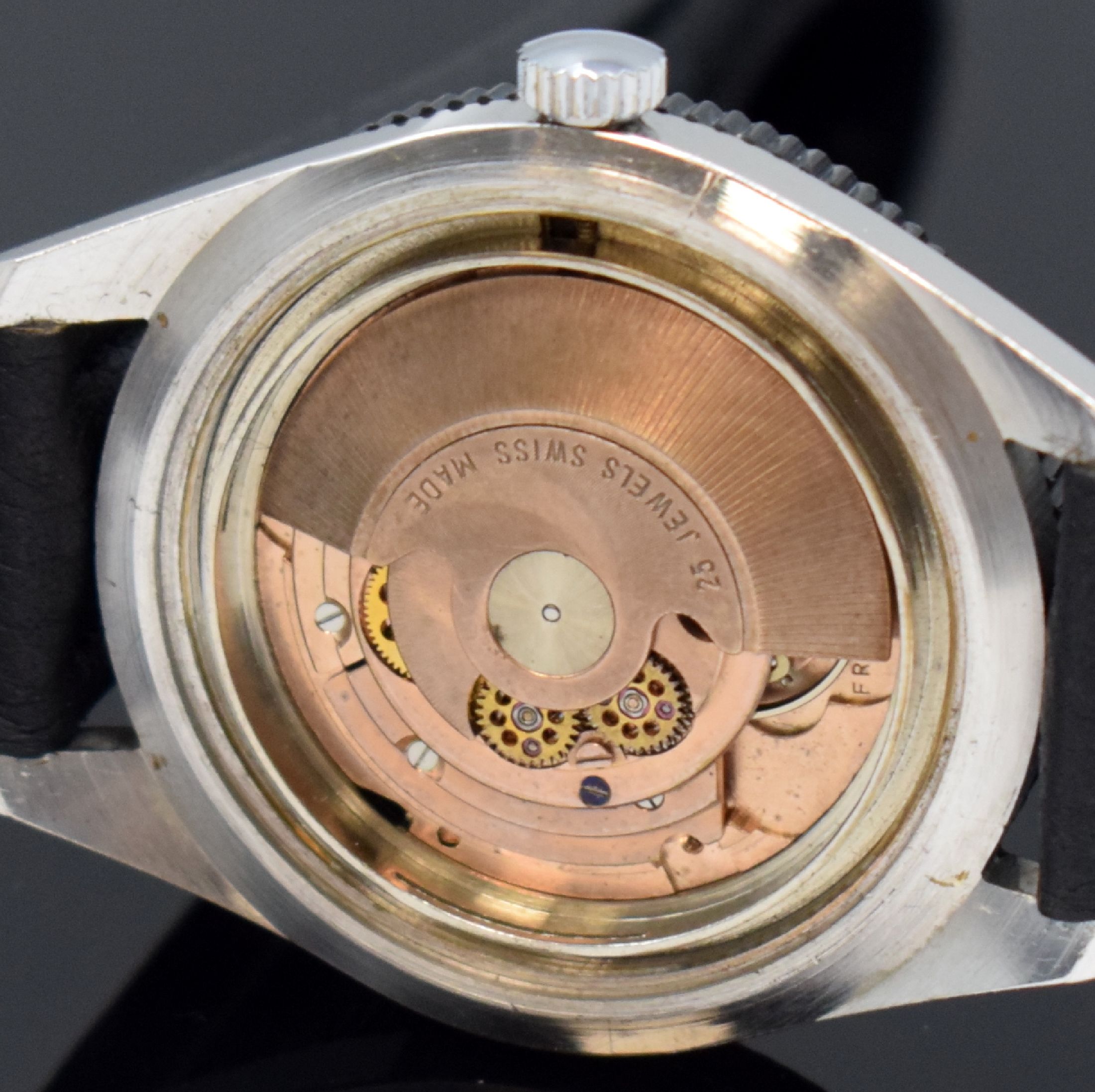 Detail j: PRECIMAX gut erhaltene Herrenarmbanduhr 37,5 mm, Schweiz um 1960, Automatik, 2-teil. verchr. Gehäuse, Boden geschr., schwarze Lünette m. 60er ...