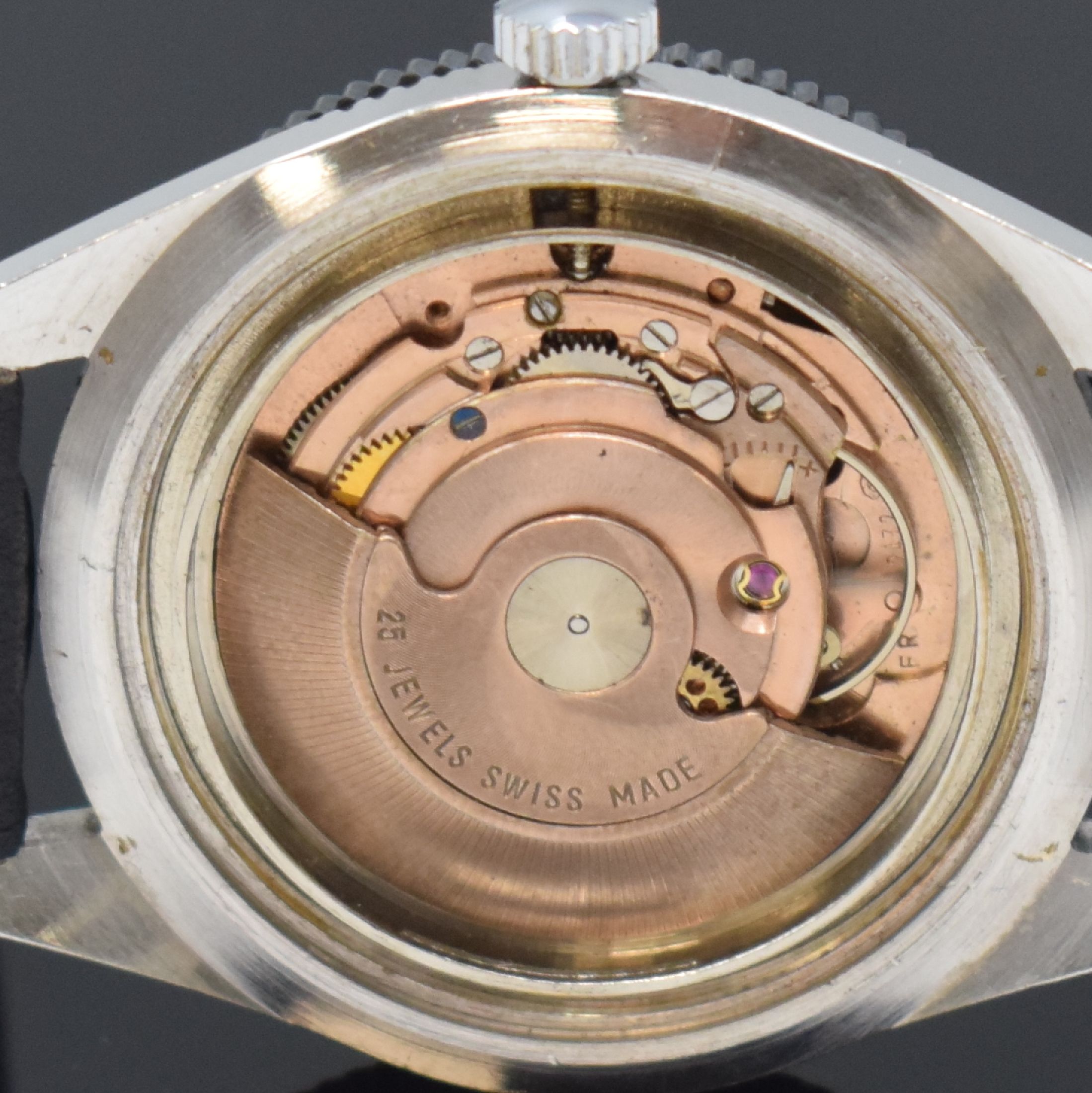 Detail k: PRECIMAX gut erhaltene Herrenarmbanduhr 37,5 mm, Schweiz um 1960, Automatik, 2-teil. verchr. Gehäuse, Boden geschr., schwarze Lünette m. 60er ...