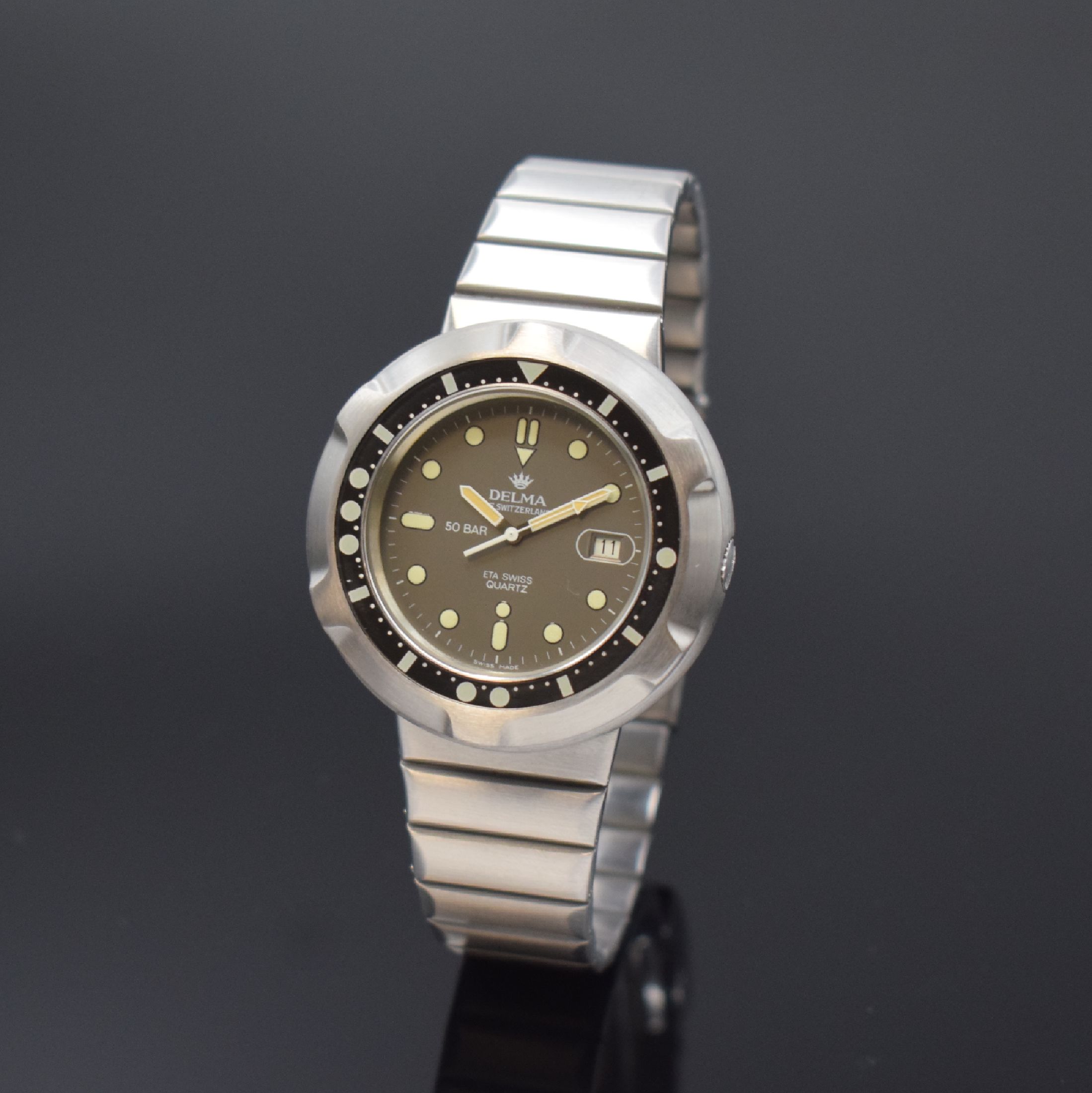 DELMA seltene Taucherarmbanduhr in Stahl, Schweiz um 1980, quarz, 2-teil. Monocoque-Geh. m. Bajonette-Befestigung im Band integr., eins. drehb. ...