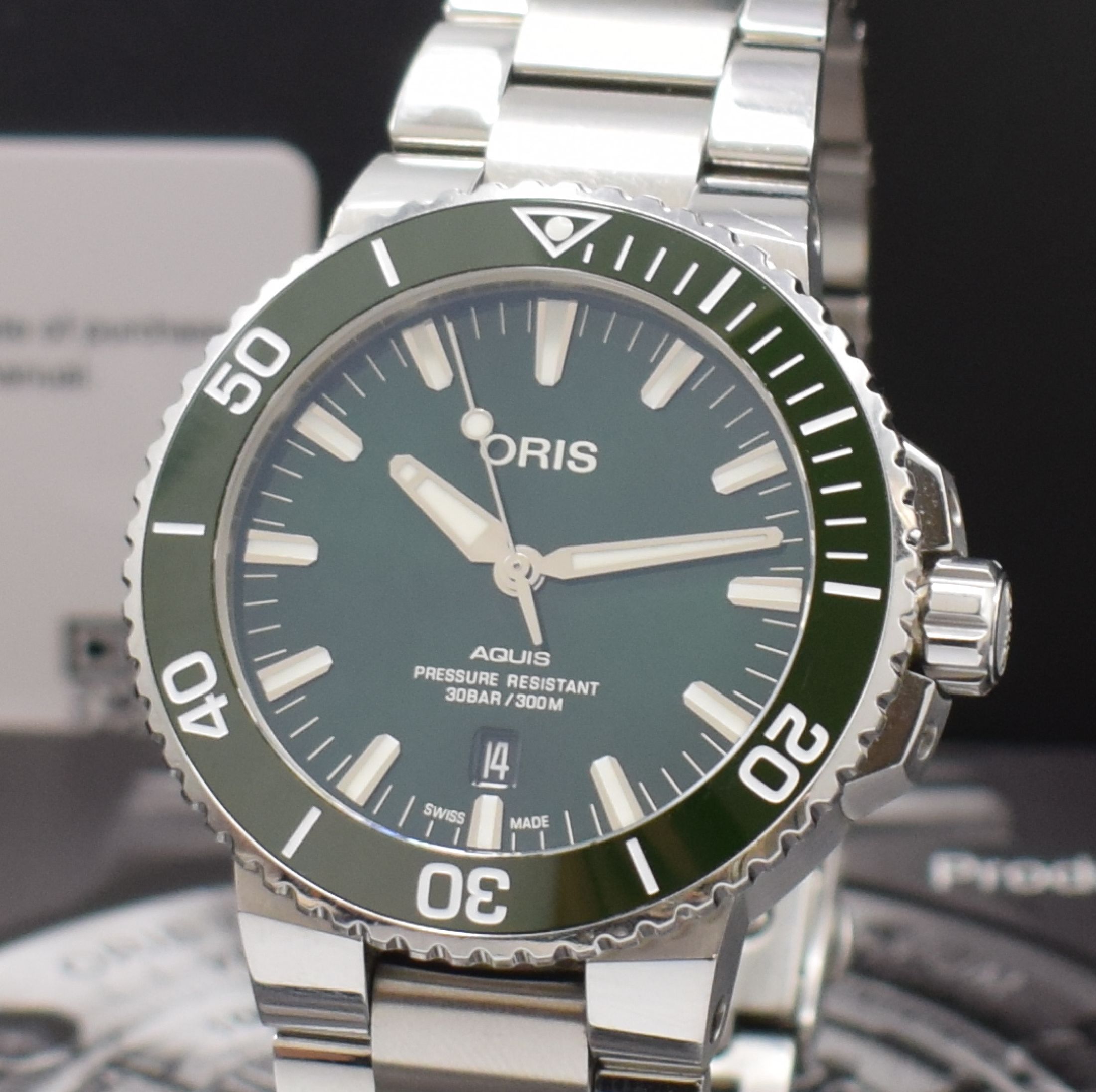 Detail a: ORIS Aquis Herrenarmbanduhr in Edelstahl Referenz 0173377304157, Schweiz um 2018, Automatik, beids. vergl. Geh. inkl. Gliederband mit Faltschl., ...
