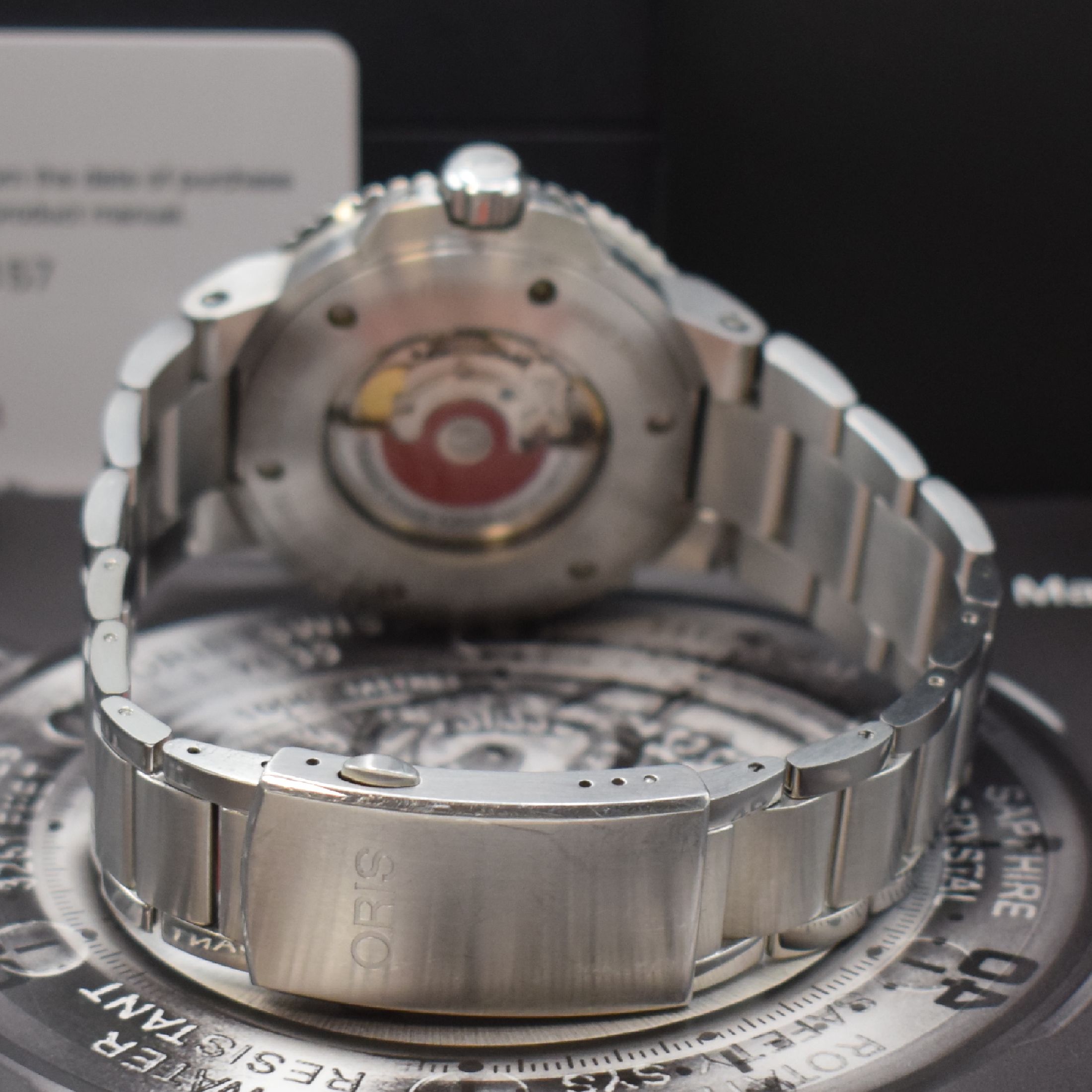 Detail b: ORIS Aquis Herrenarmbanduhr in Edelstahl Referenz 0173377304157, Schweiz um 2018, Automatik, beids. vergl. Geh. inkl. Gliederband mit Faltschl., ...