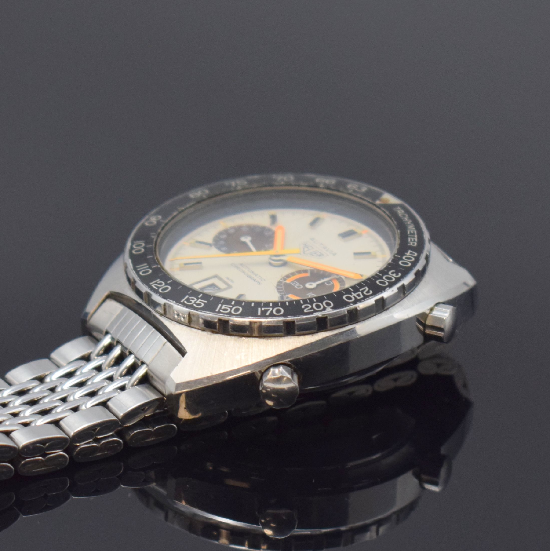 Detail d: HEUER Autavia "Orange Boy" seltener Armbandchronograph in Edelstahl Referenz 11630, Schweiz um 1975, Automatik, orig. Gay Freres ...