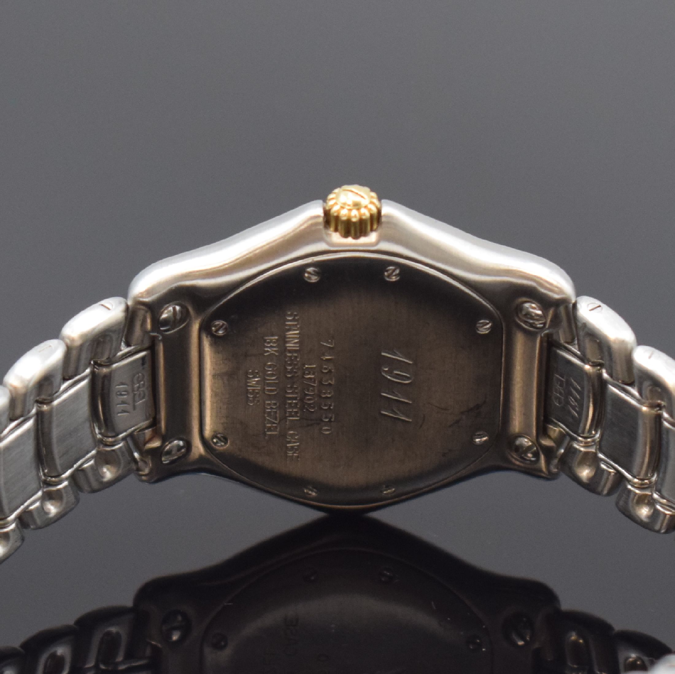 Detail d: EBEL Armbanduhr Serie 1911 Referenz 187902, Schweiz um 1995, quarz, Edelstahlgeh. inkl. z. T. verg. Gliederband m. Faltschl., 18k Goldlünette gegen ...