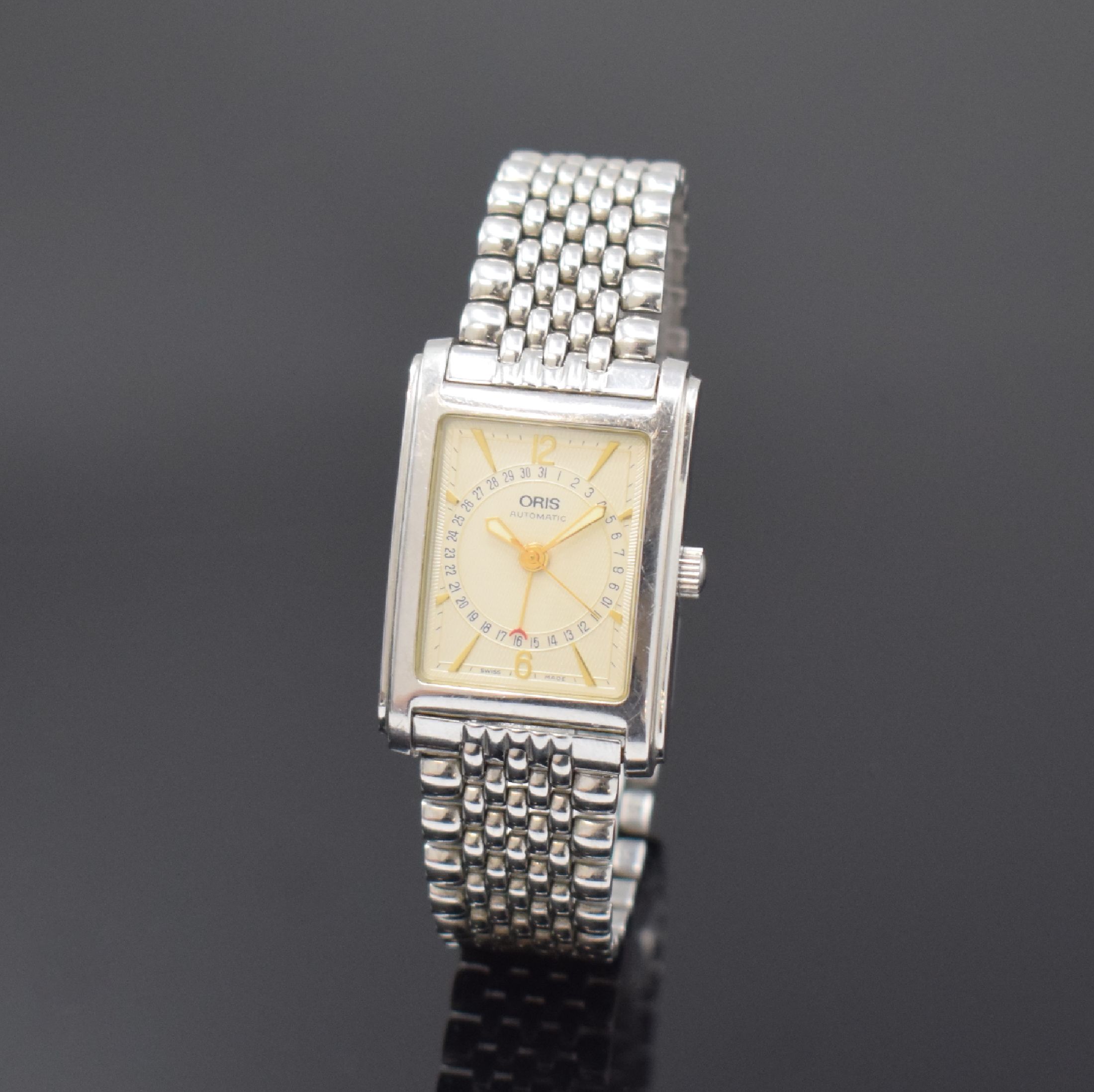 ORIS rechteckige Armbanduhr mit Zeigerdatum Referenz B7460, Schweiz um 1995, Edelstahlgeh. inkl. Gliederband m. Faltschl., Boden 4-fach verschr., ...