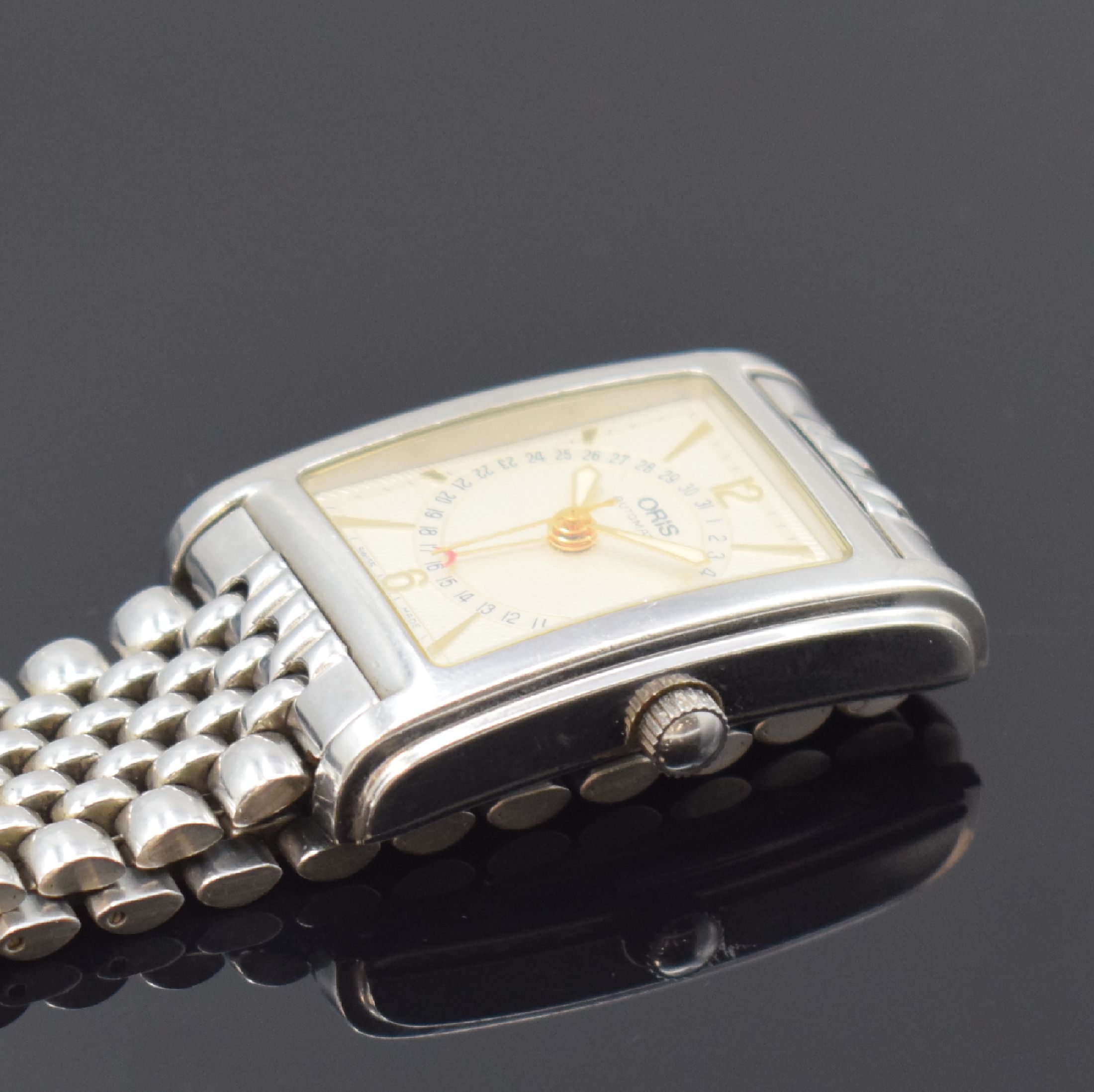 Detail c: ORIS rechteckige Armbanduhr mit Zeigerdatum Referenz B7460, Schweiz um 1995, Edelstahlgeh. inkl. Gliederband m. Faltschl., Boden 4-fach verschr., ...