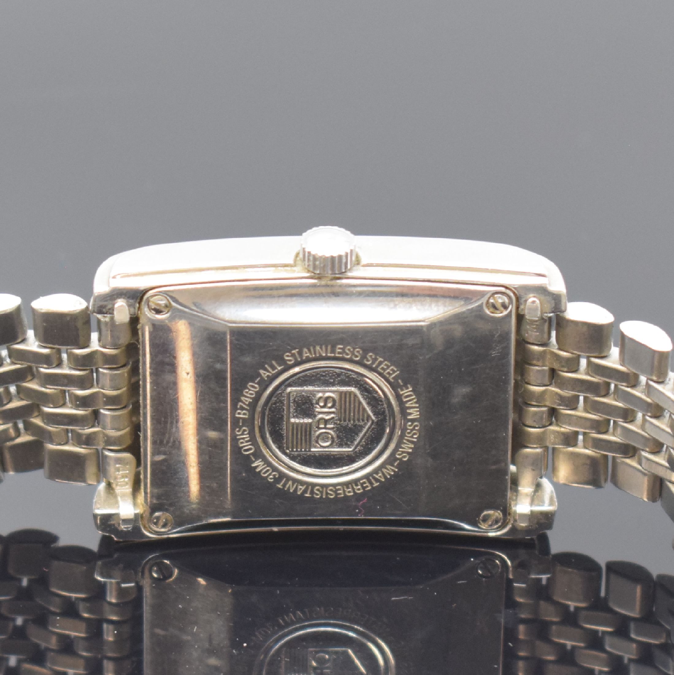 Detail d: ORIS rechteckige Armbanduhr mit Zeigerdatum Referenz B7460, Schweiz um 1995, Edelstahlgeh. inkl. Gliederband m. Faltschl., Boden 4-fach verschr., ...