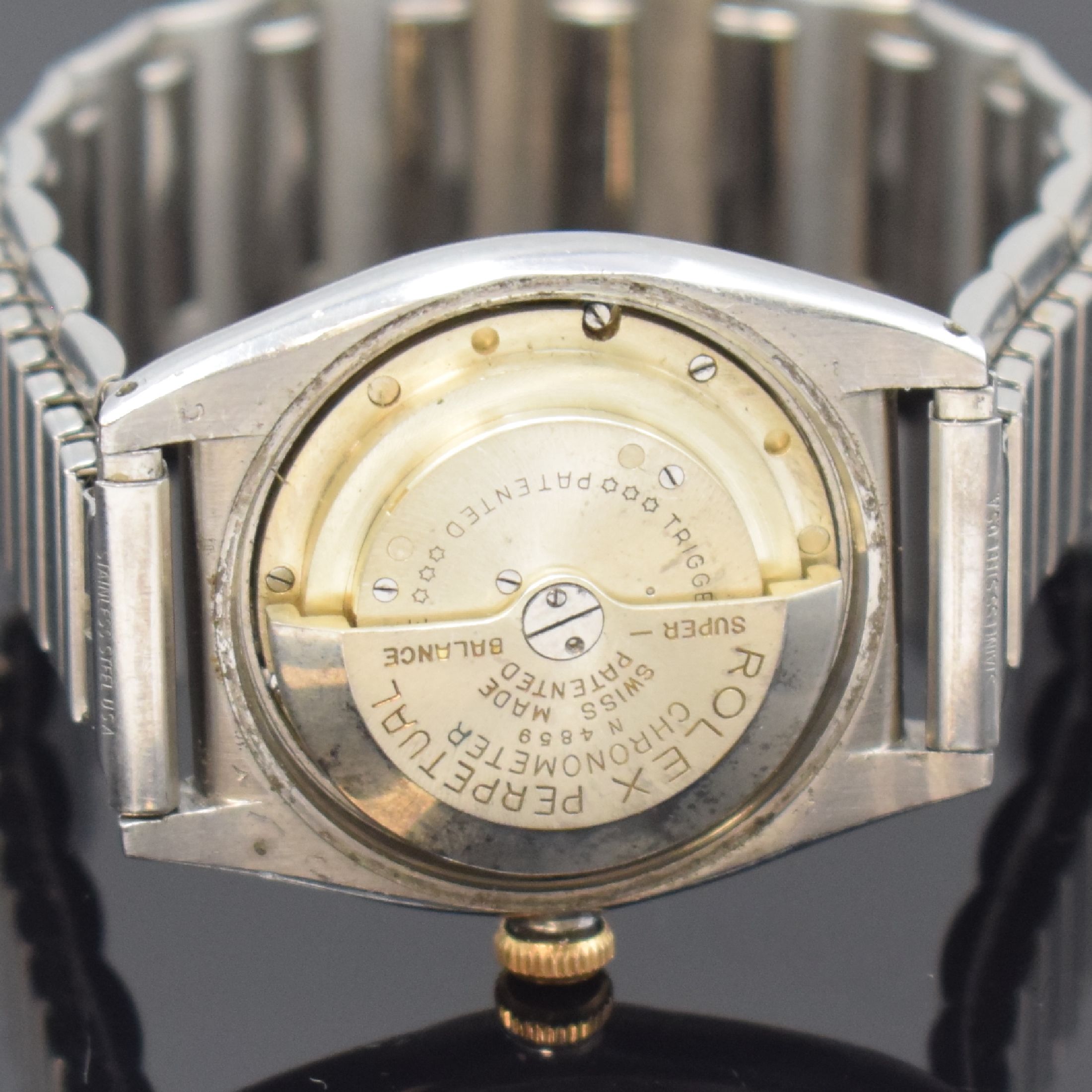 Detail e: ROLEX Oyster Perpetual Bubble Back Herrenarmbanduhr Referenz 3133, Schweiz um 1945, Automatik, verschr. Edelstahlgehäuse mit Goldlünette, Flexband, ...