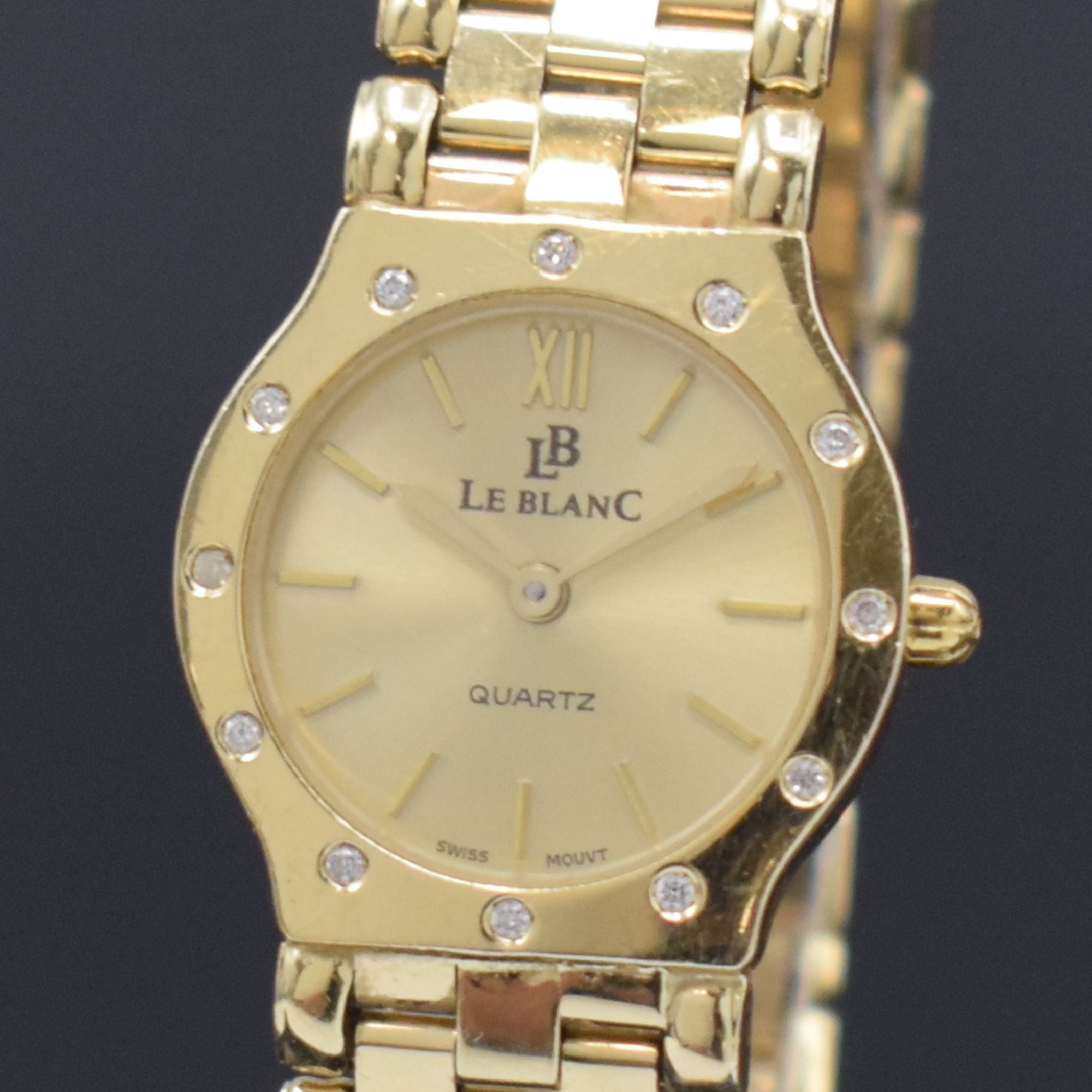 Detail a: LE BLANC Damenarmbanduhr in GG 585/000, Schweiz um 1985, quarz, 2-teil. Gehäuse, Boden aufgedr., Lünette m. Diamanten bes., gold. Zifferbl. m. ...