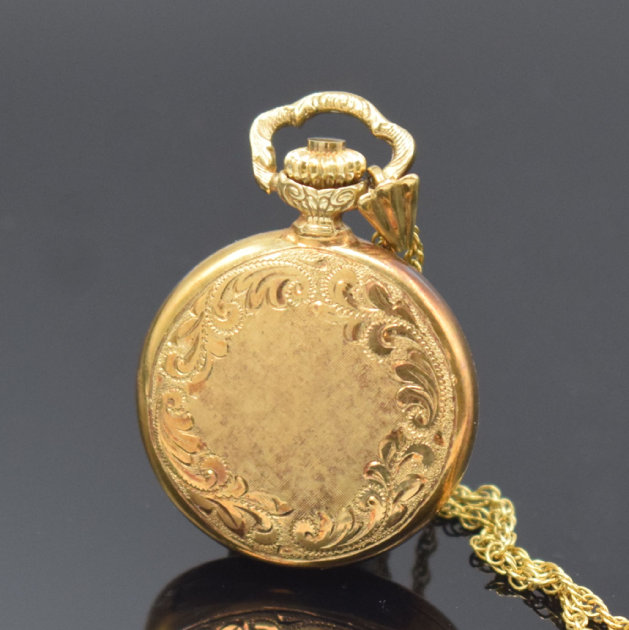 Detail c: AMARA Damentaschenuhr in GG 585/000 mit Goldkette, Schweiz um 1975, Handaufzug, gold. Zifferbl. m. röm. Zahlen, schwarze Zeiger, Kette in GG ...