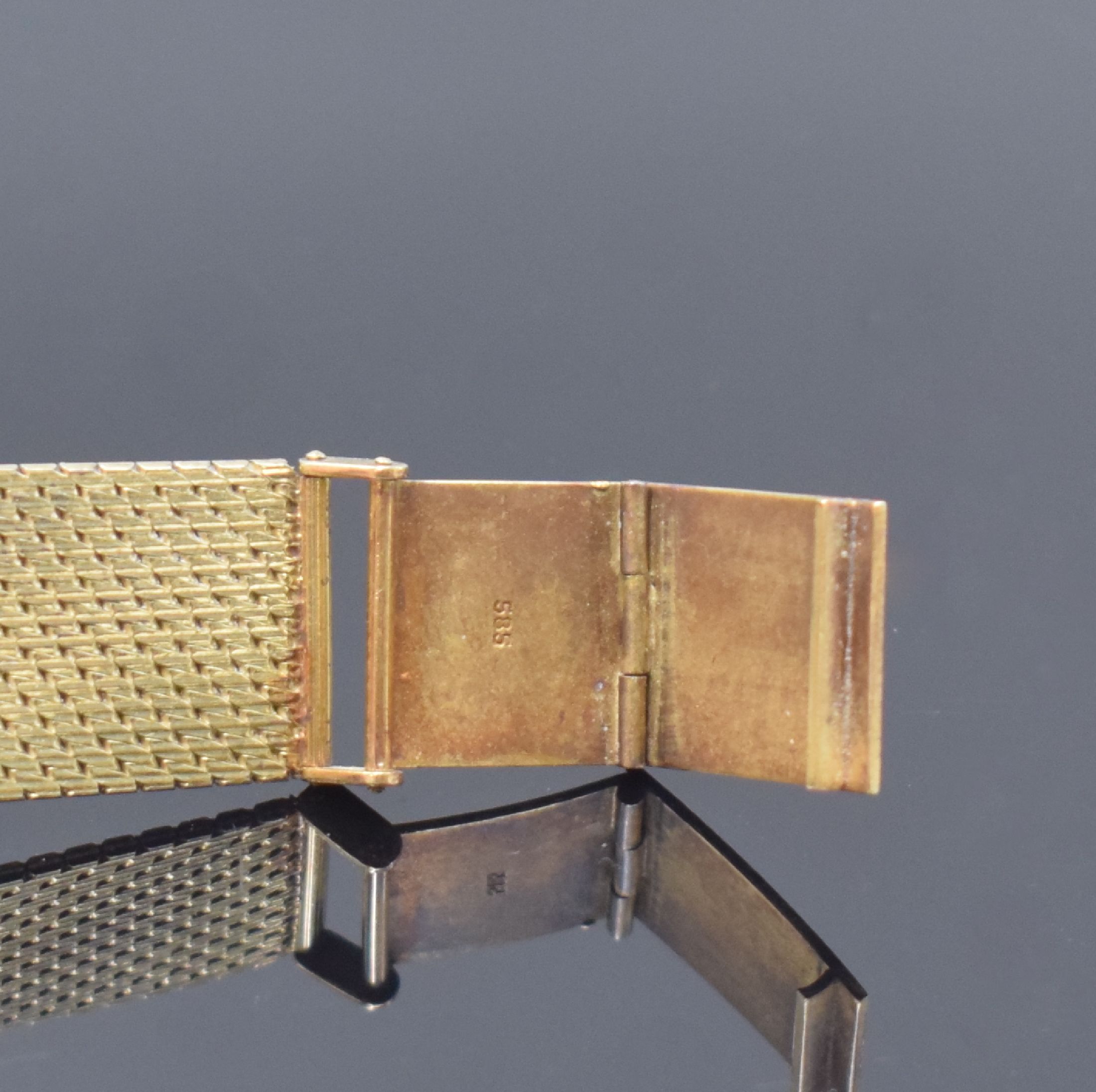 Detail b: GENEVE Herrenarmbanduhr in GG 585/000 mit Goldband, Schweiz um 1980, quarz, 2-teil. Geh., Boden aufgedr., gold. Zifferbl. u. Zeiger, Datum, D. ca. 34 ...