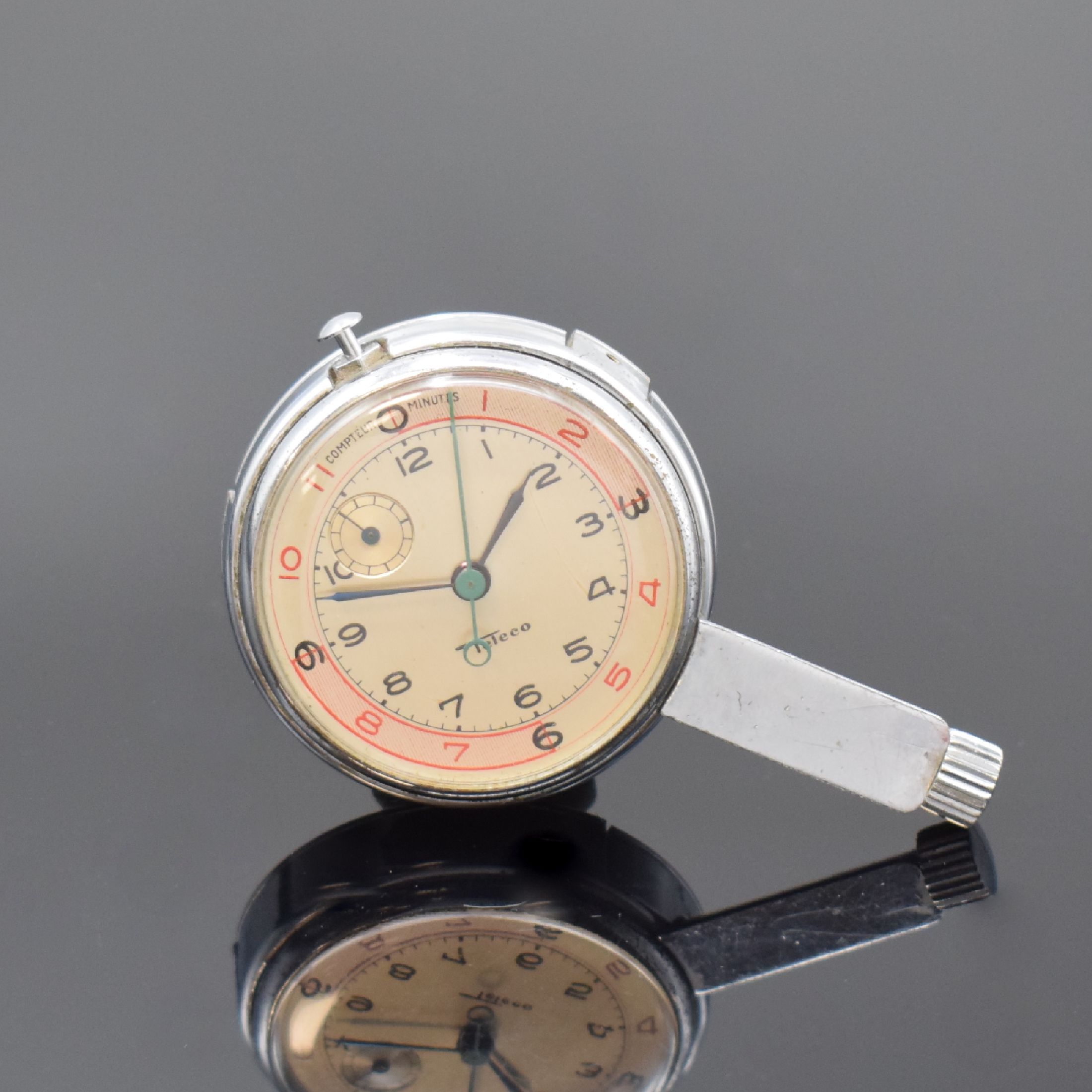 ANGELUS / TELECO Einbauuhr mit Minutenzähler- Chronograph, Schweiz um 1945, Handaufzug, verchr. Geh., Aufzug b. 5, silb. Zifferbl., arab. Zahlen, ...