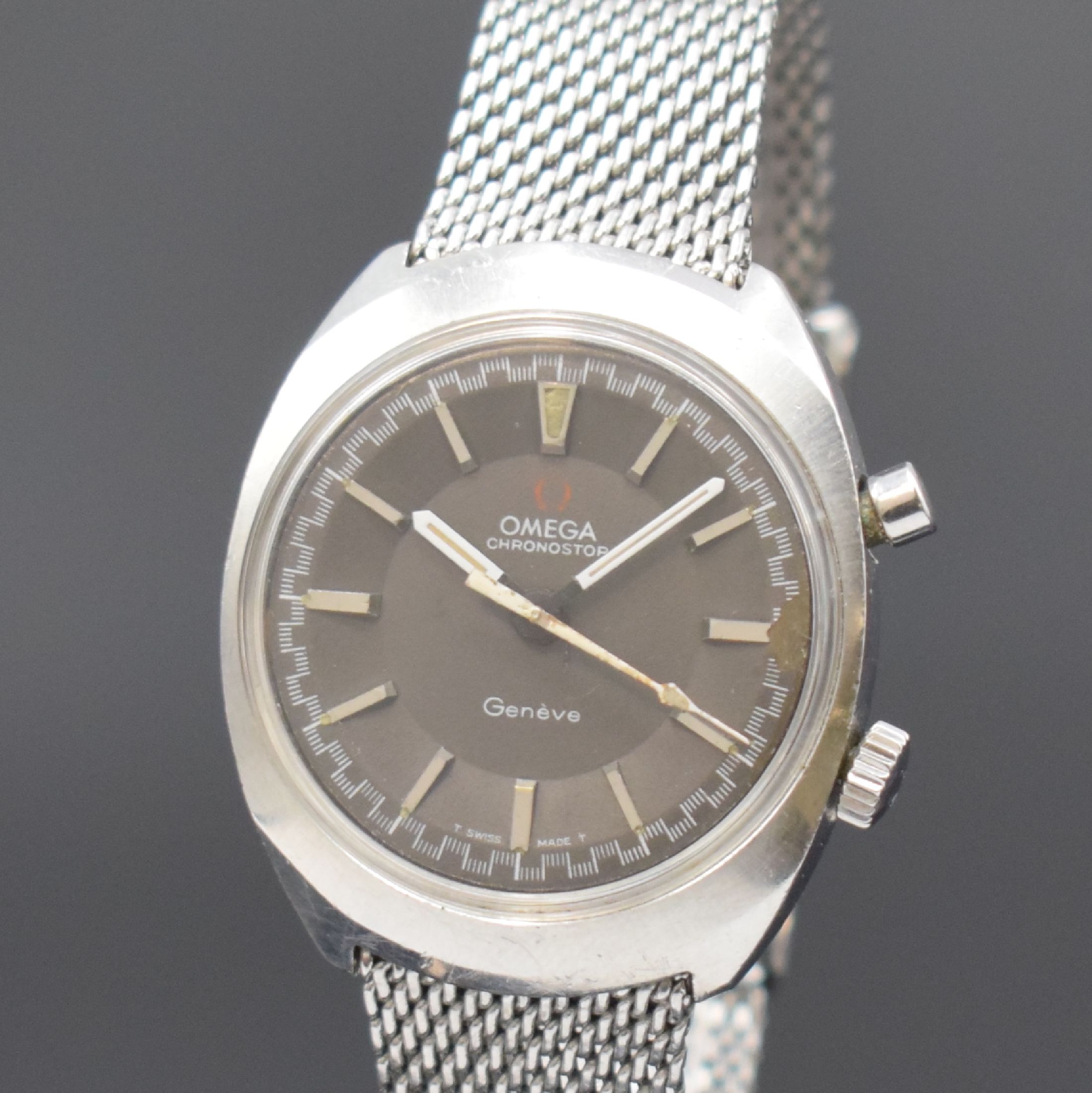 Detail a: OMEGA Chronostop Herrenarmbanduhr in Stahl/Stahlband Referenz 145.009, Schweiz um 1969, Handaufzug, verschr. Geh., Stahl Milanaiseband Nr. 27, graues ...