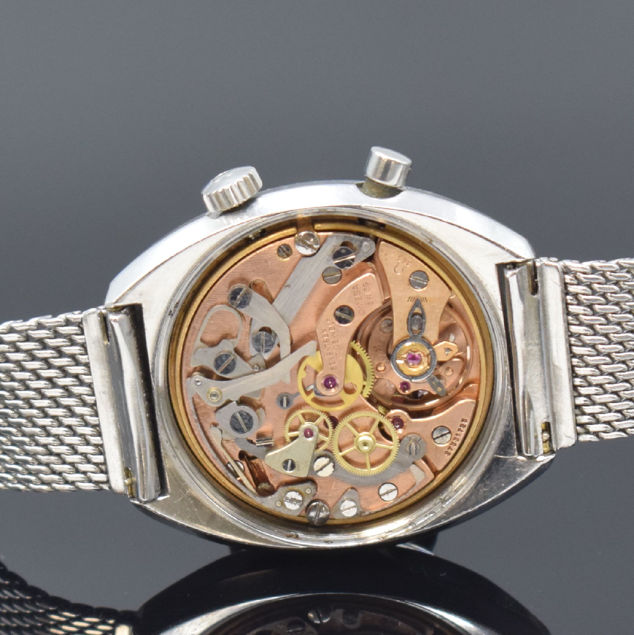 Detail e: OMEGA Chronostop Herrenarmbanduhr in Stahl/Stahlband Referenz 145.009, Schweiz um 1969, Handaufzug, verschr. Geh., Stahl Milanaiseband Nr. 27, graues ...