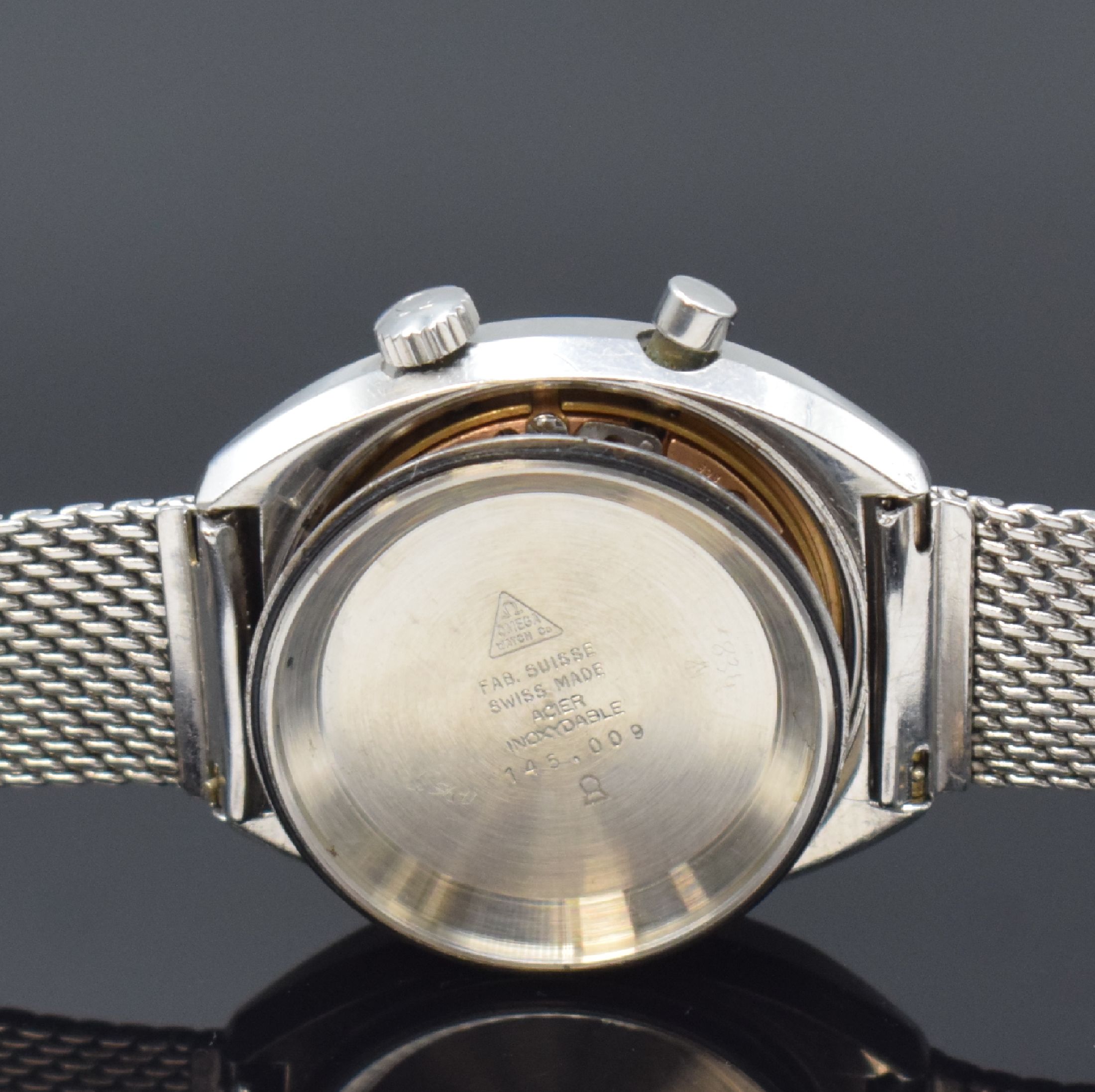 Detail f: OMEGA Chronostop Herrenarmbanduhr in Stahl/Stahlband Referenz 145.009, Schweiz um 1969, Handaufzug, verschr. Geh., Stahl Milanaiseband Nr. 27, graues ...